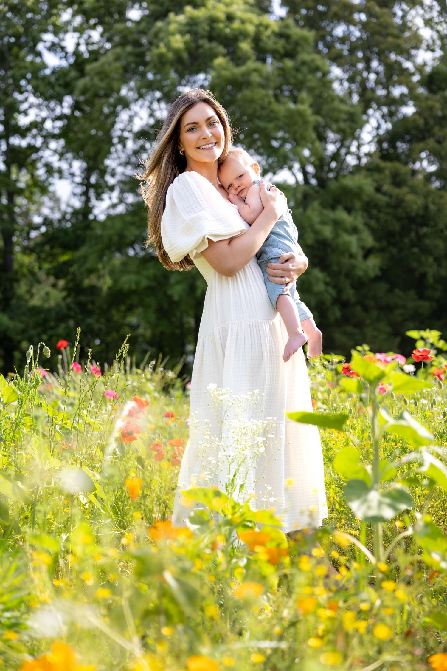 Sweet family moments captured in a blooming wildflower field at Blue Hill Garden in Monroe, NC.