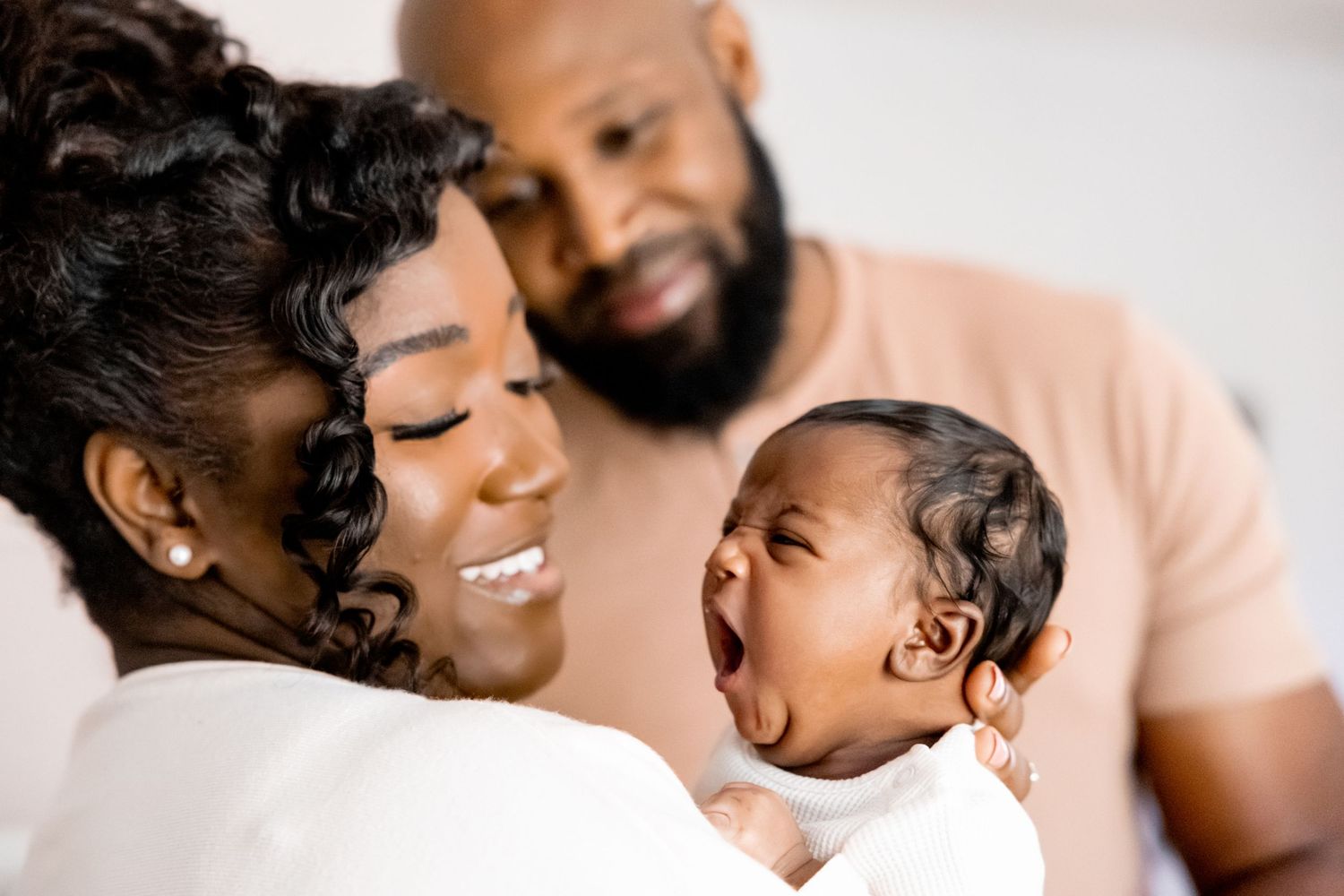 Beautiful lifestyle family photography captures candid moments of joy and laughter.