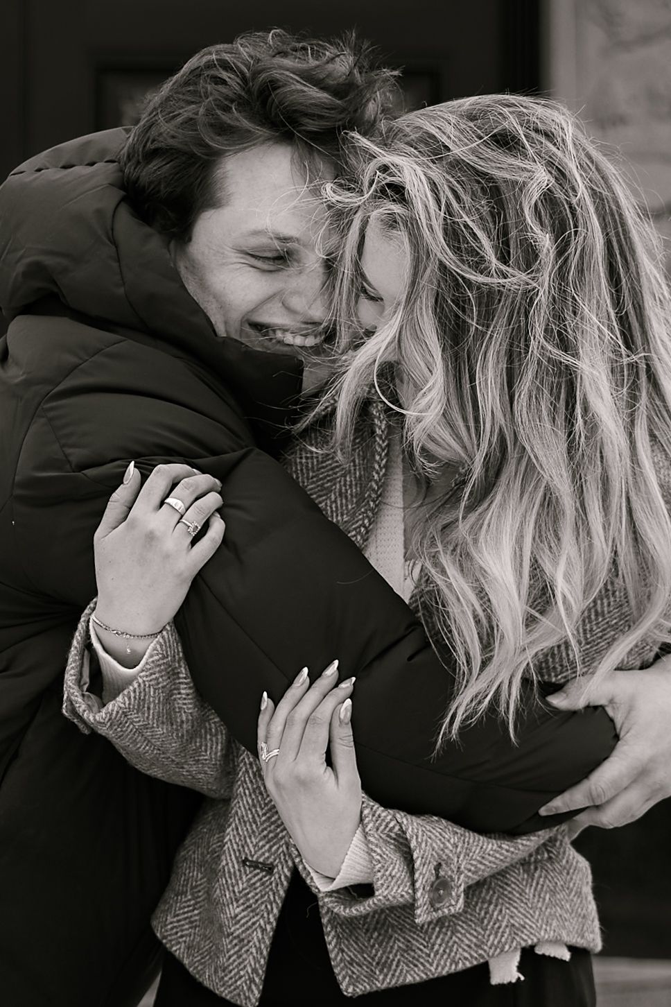 A black and white photo sequence shows two people embracing in an intimate emotional moment.