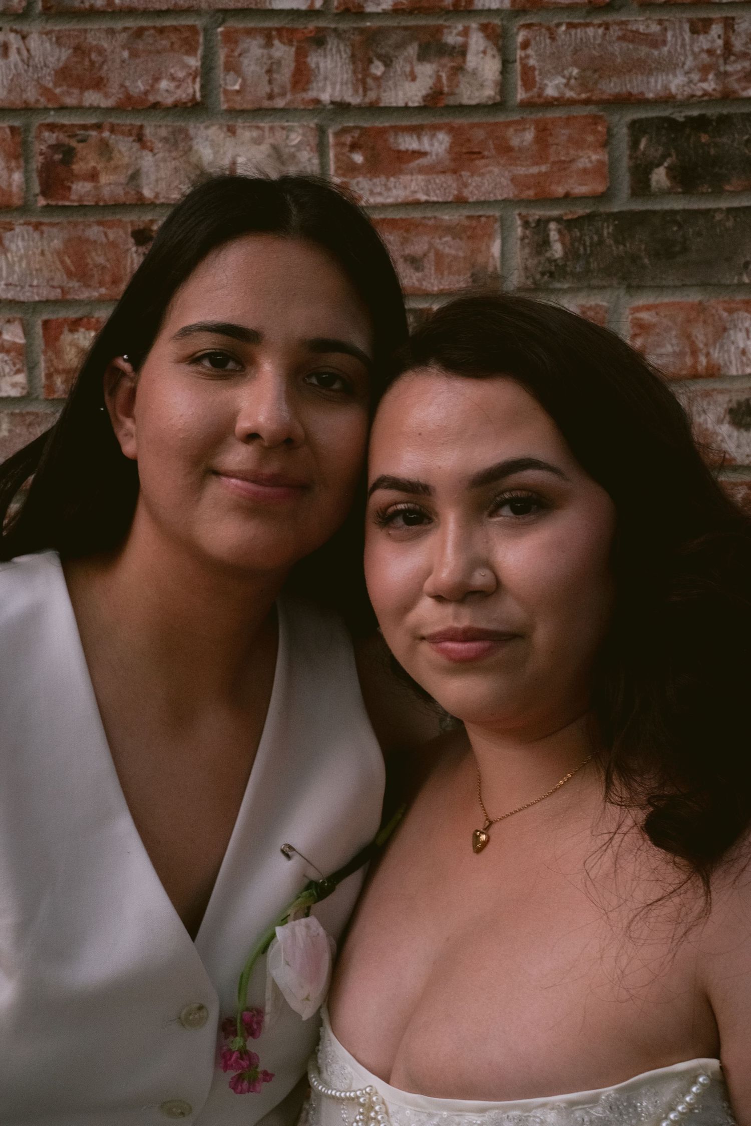 Two brides at their backyard wedding in Denton, TX
