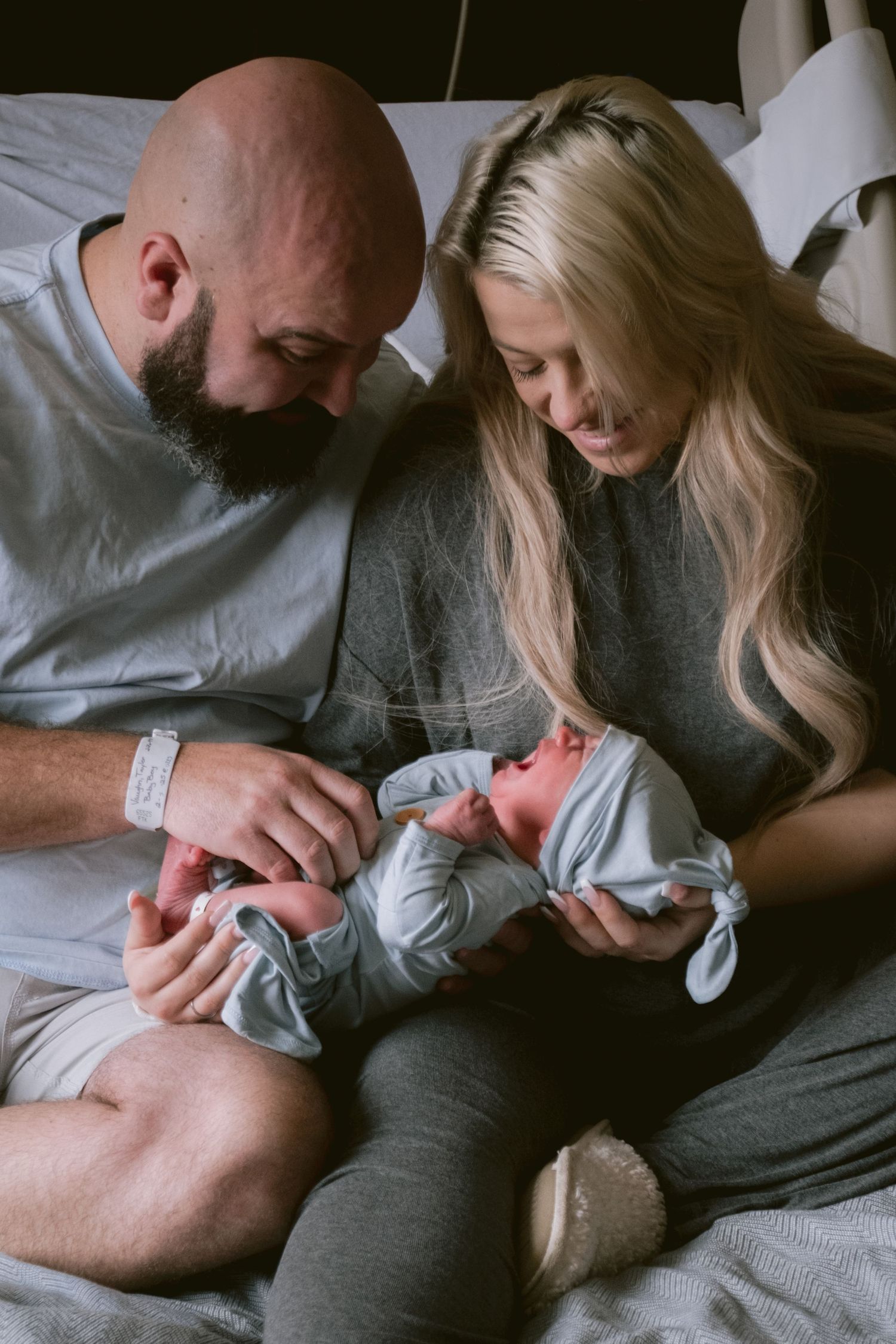 New parents holding their newborn son in Fort Worth Texas