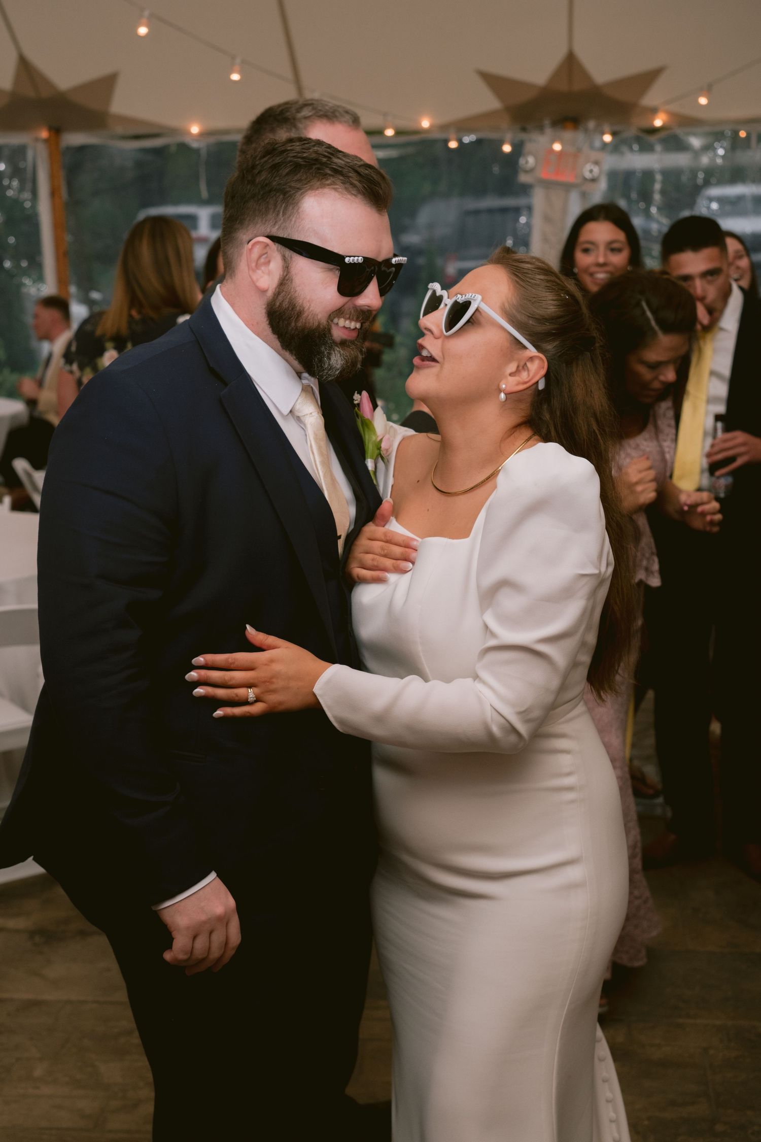 A newlywed couple at their wedding reception at the Sagamore Inn in Sandwich, MA, Cape Cod.