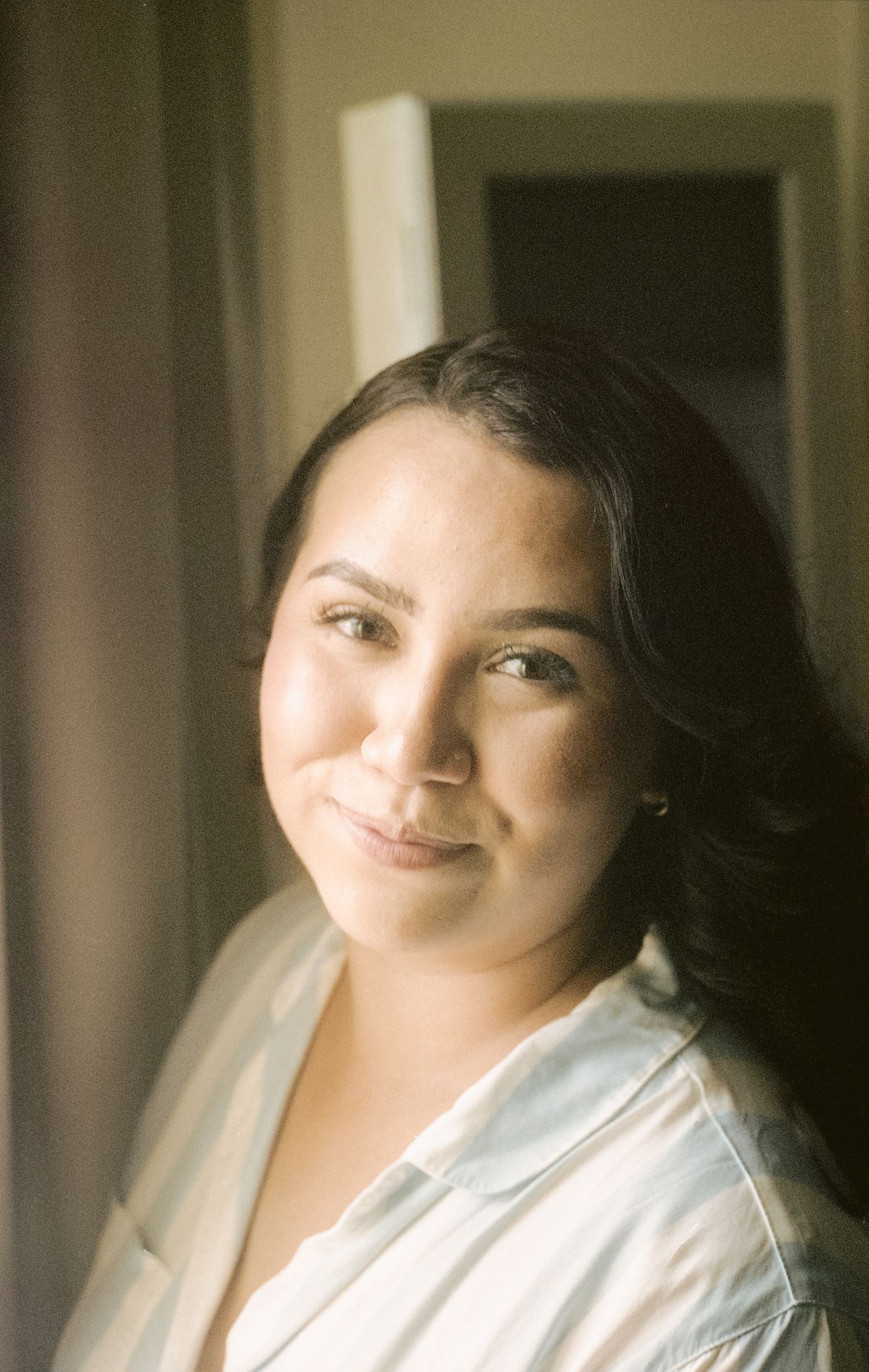 Film image of a bride preparing for her wedding in Denton, TX