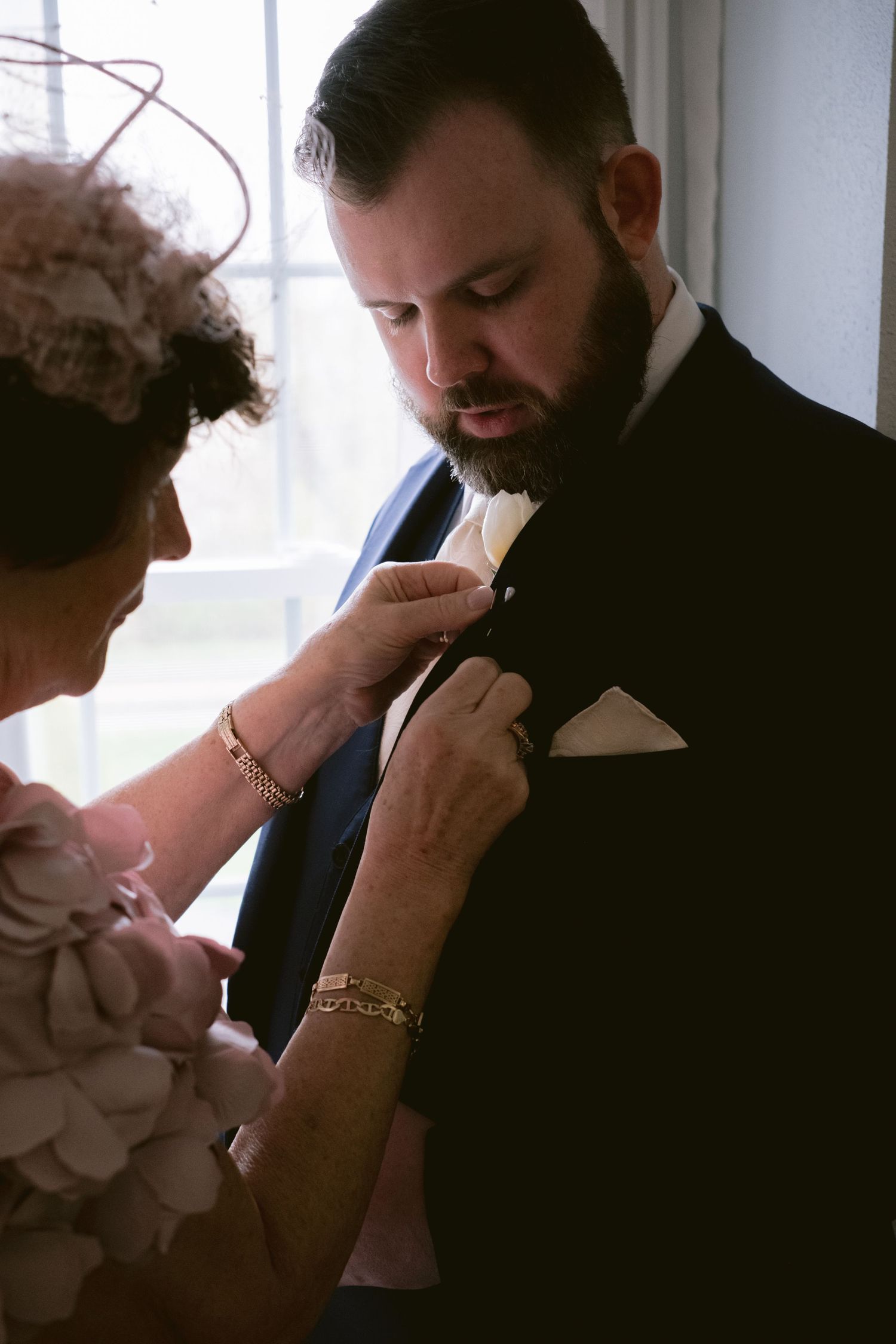 A groom preparing for his wedding in Cape Cod
