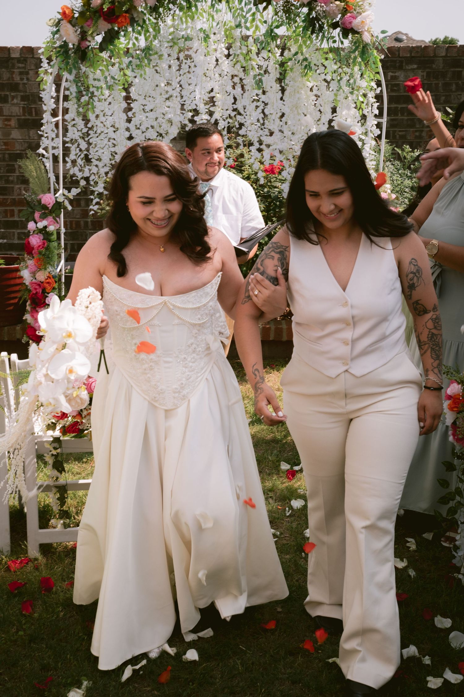 Two brides at their backyard wedding in Denton, TX