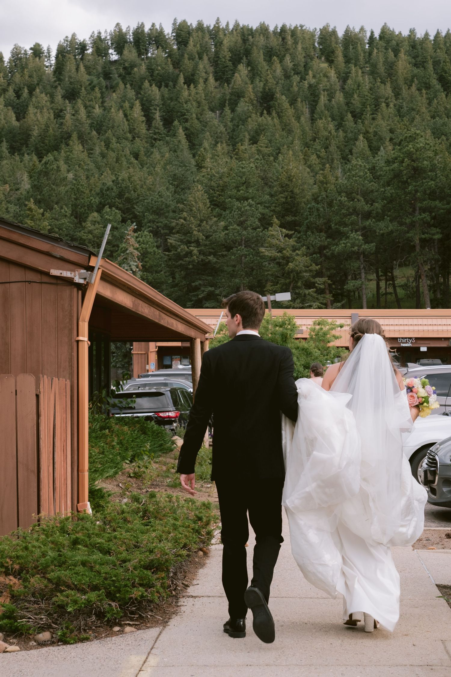 A newlywed couple at their wedding at Christie's of Genesee in Golden, Colorado.