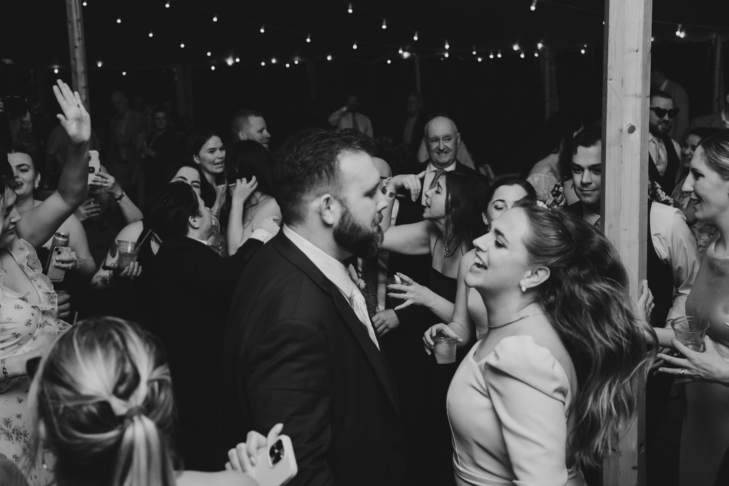 A newlywed couple at their wedding reception at the Sagamore Inn in Sandwich, MA, Cape Cod.