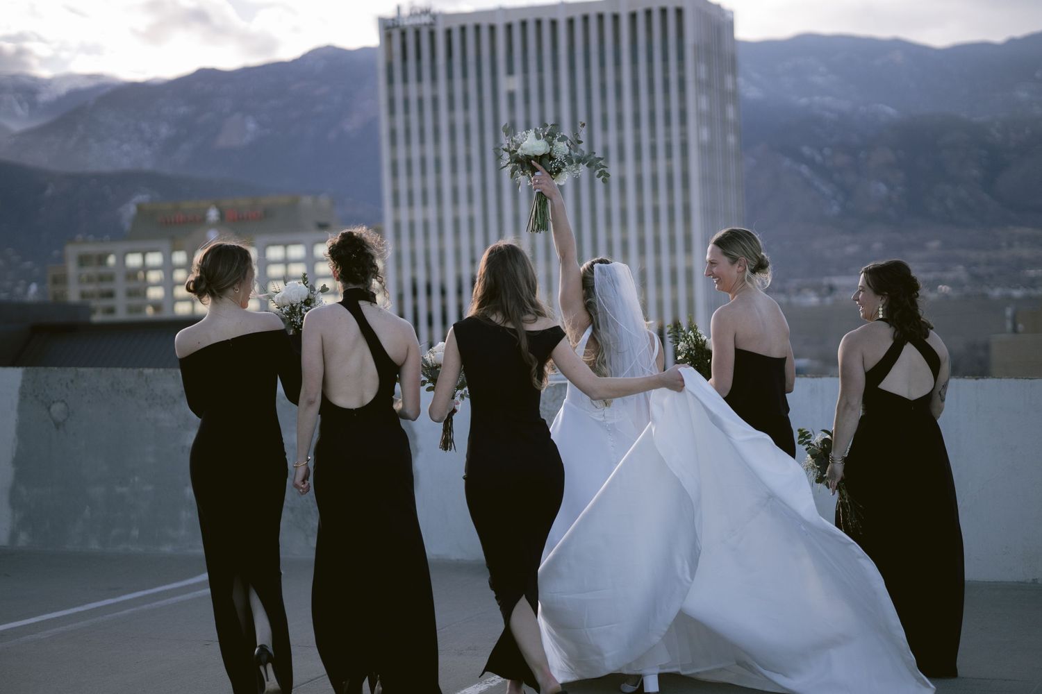 A wedding party on a rooftop in Colorado Springs, CO