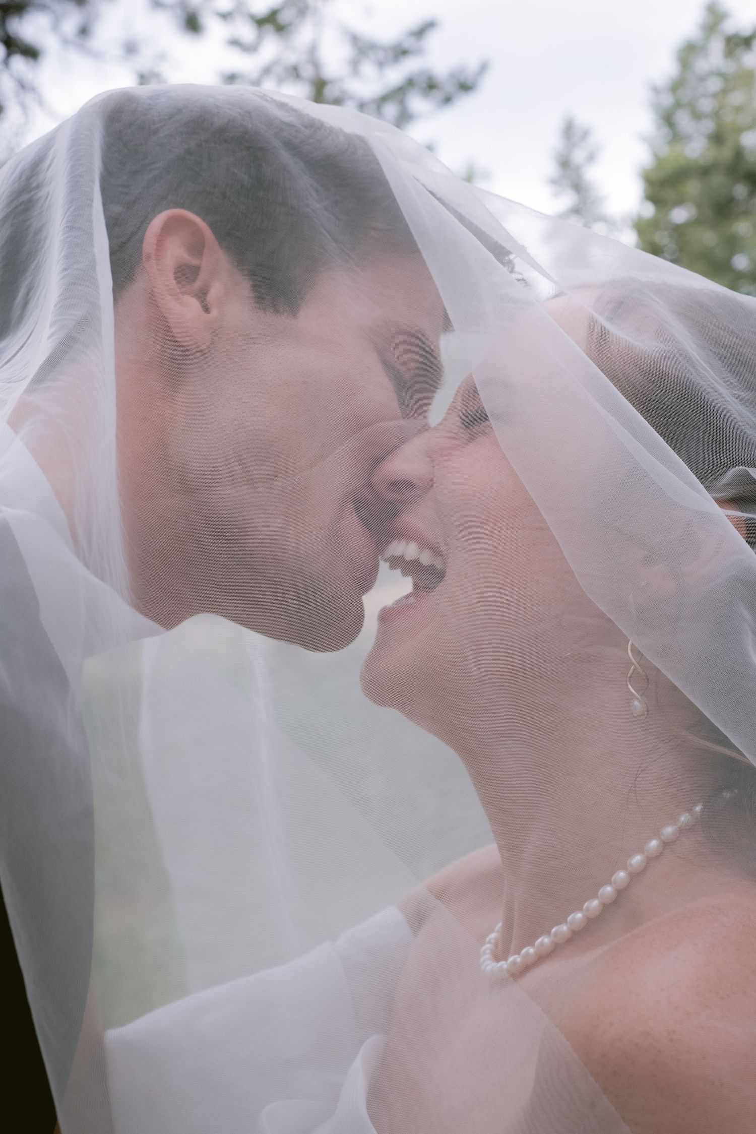 A newlywed couple at their wedding at Christie's of Genesee in Golden, Colorado.