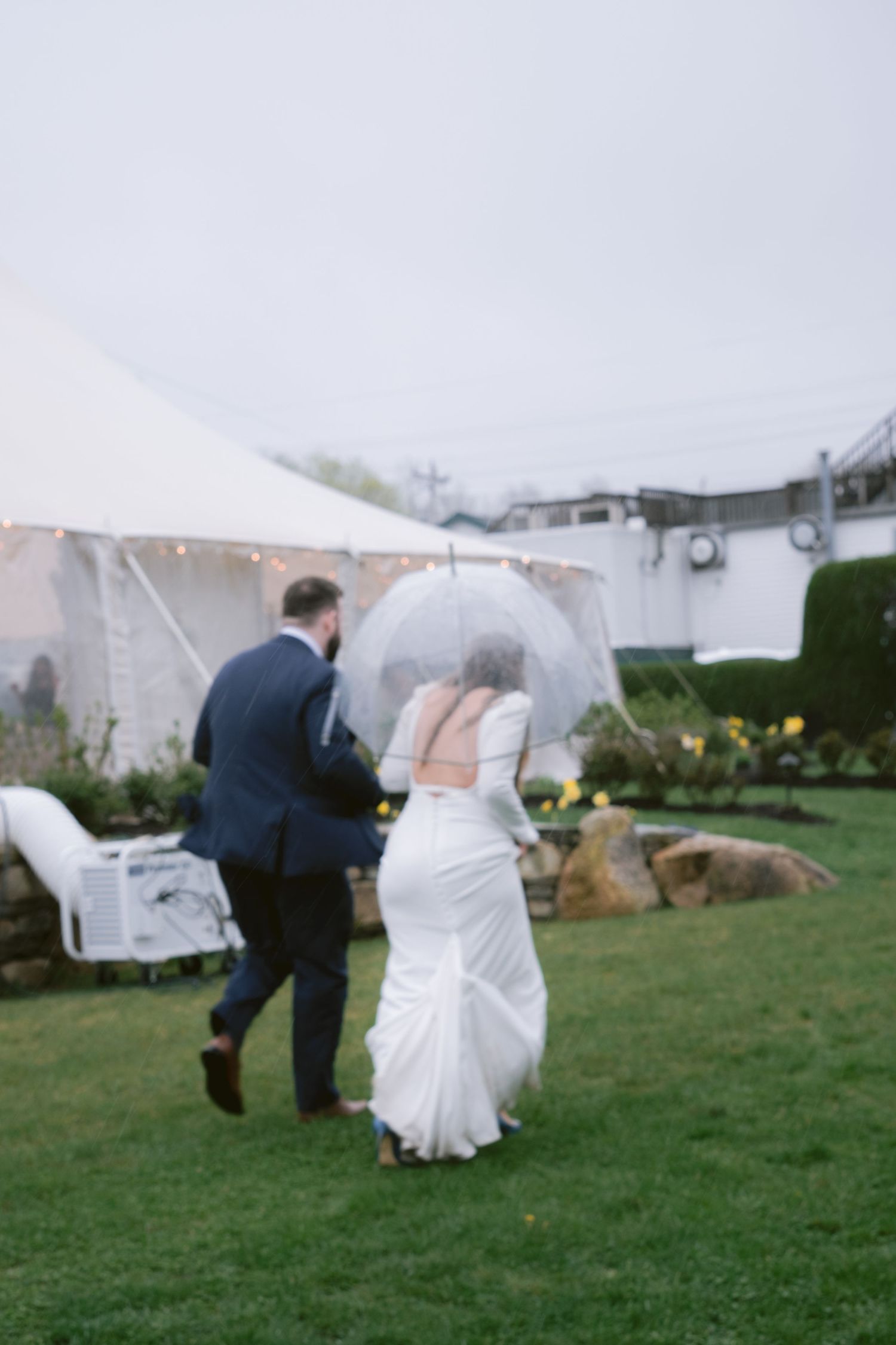 A newlywed couple at their wedding reception at the Sagamore Inn in Sandwich, MA, Cape Cod.