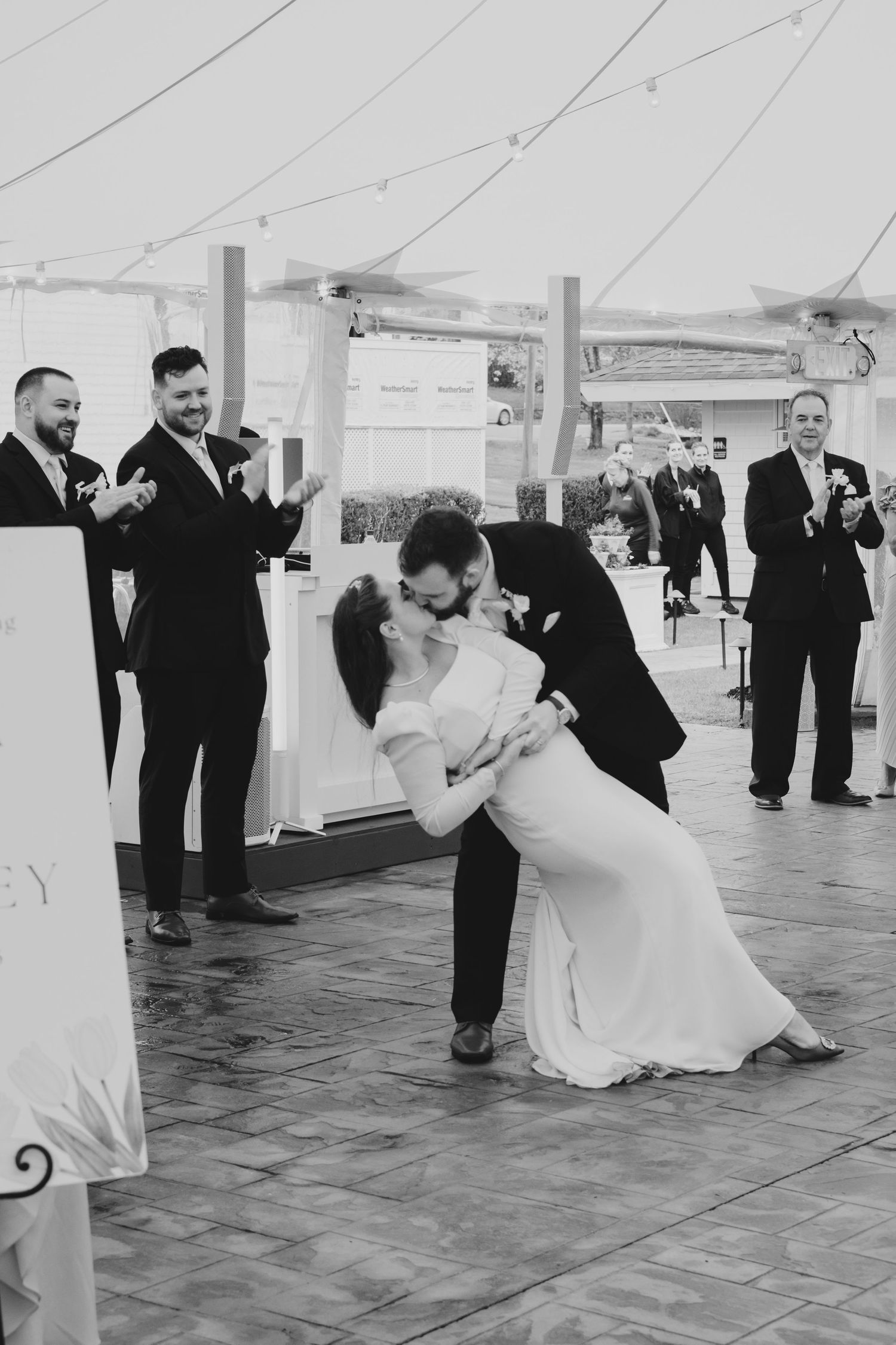 A newlywed couple at their wedding reception at the Sagamore Inn in Sandwich, MA, Cape Cod.