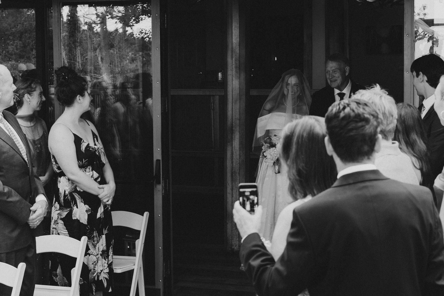 A bride walking down the aisle at Christie's of Genesee in Golden, Colorado.