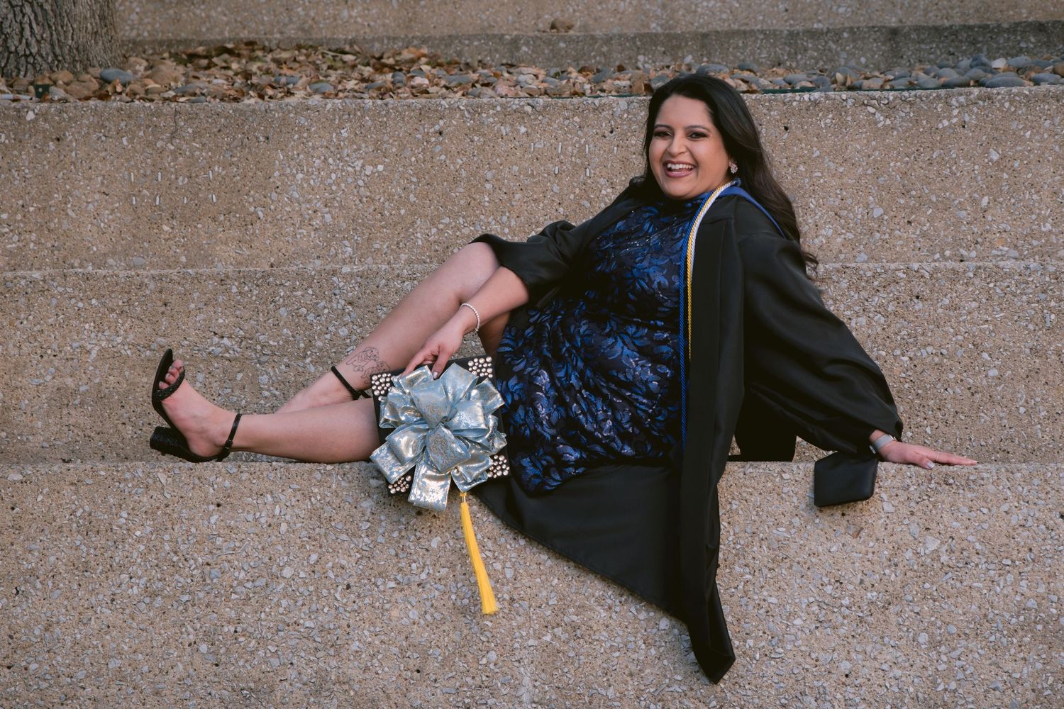 A graduate at the Mandalay Canal Walk in Las Colinas, TX