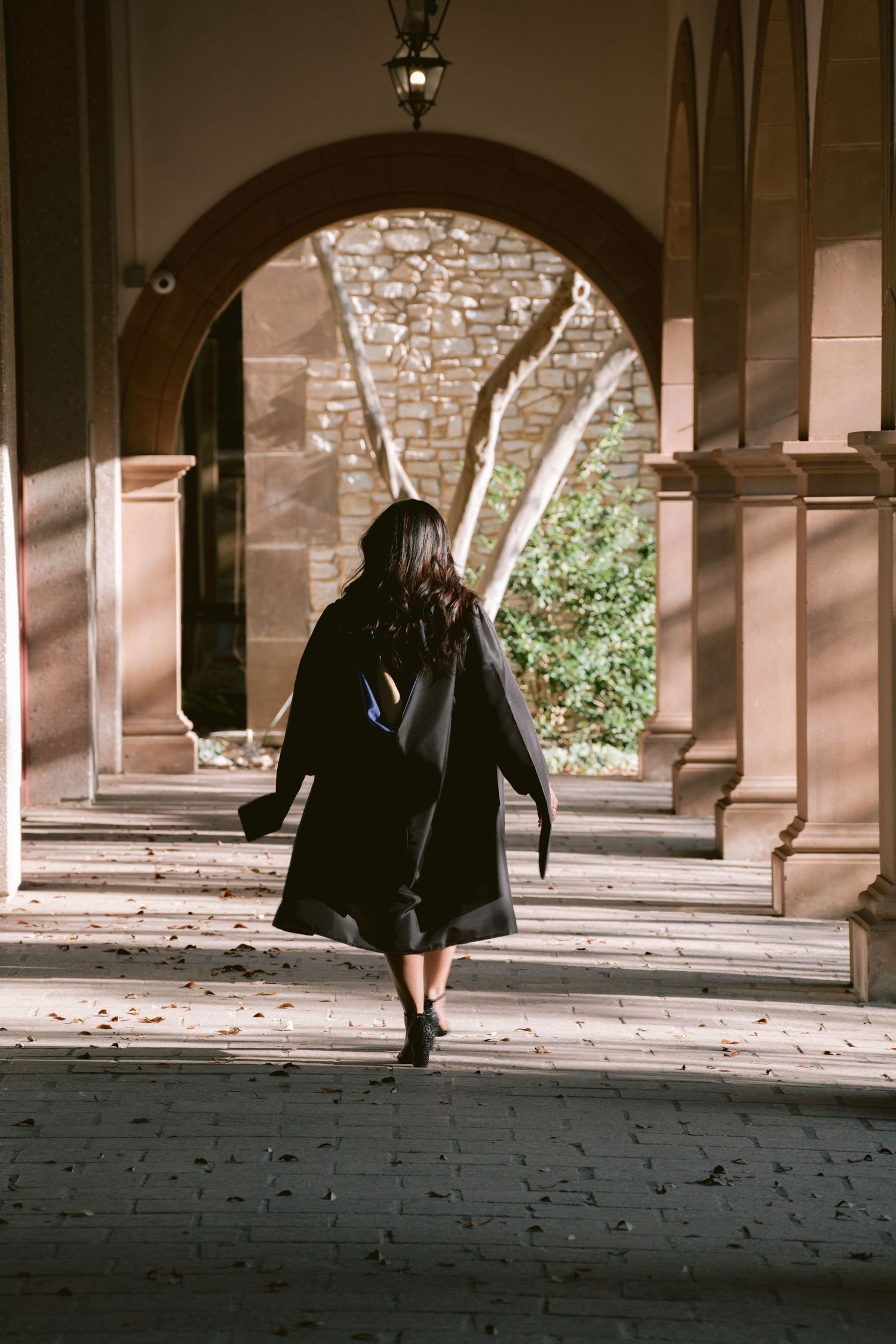 A graduate at the Mandalay Canal Walk in Las Colinas, TX