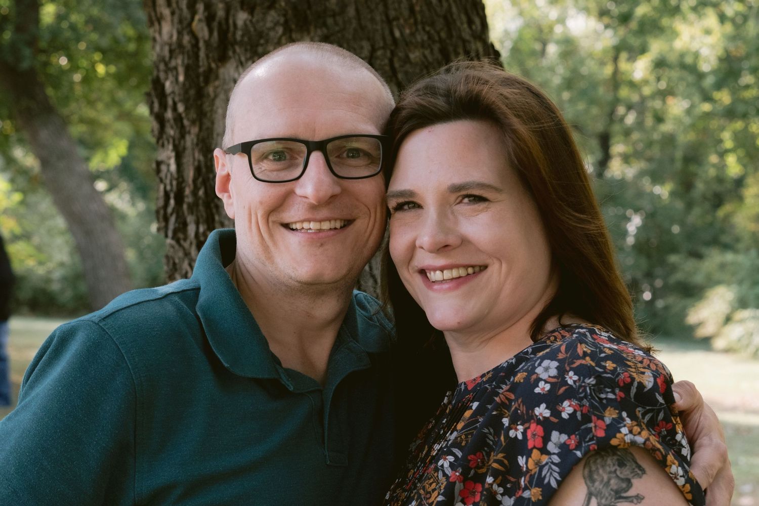 A couple posing at Trinity Park in Fort Worth, TX