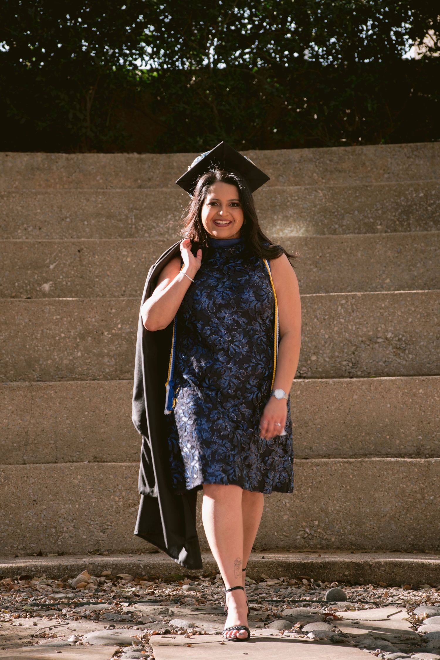 A graduate at the Mandalay Canal Walk in Las Colinas, TX