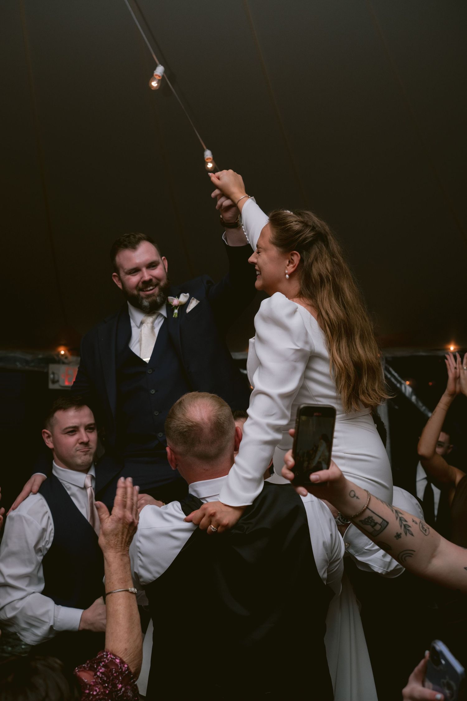 A newlywed couple at their wedding reception at the Sagamore Inn in Sandwich, MA, Cape Cod.