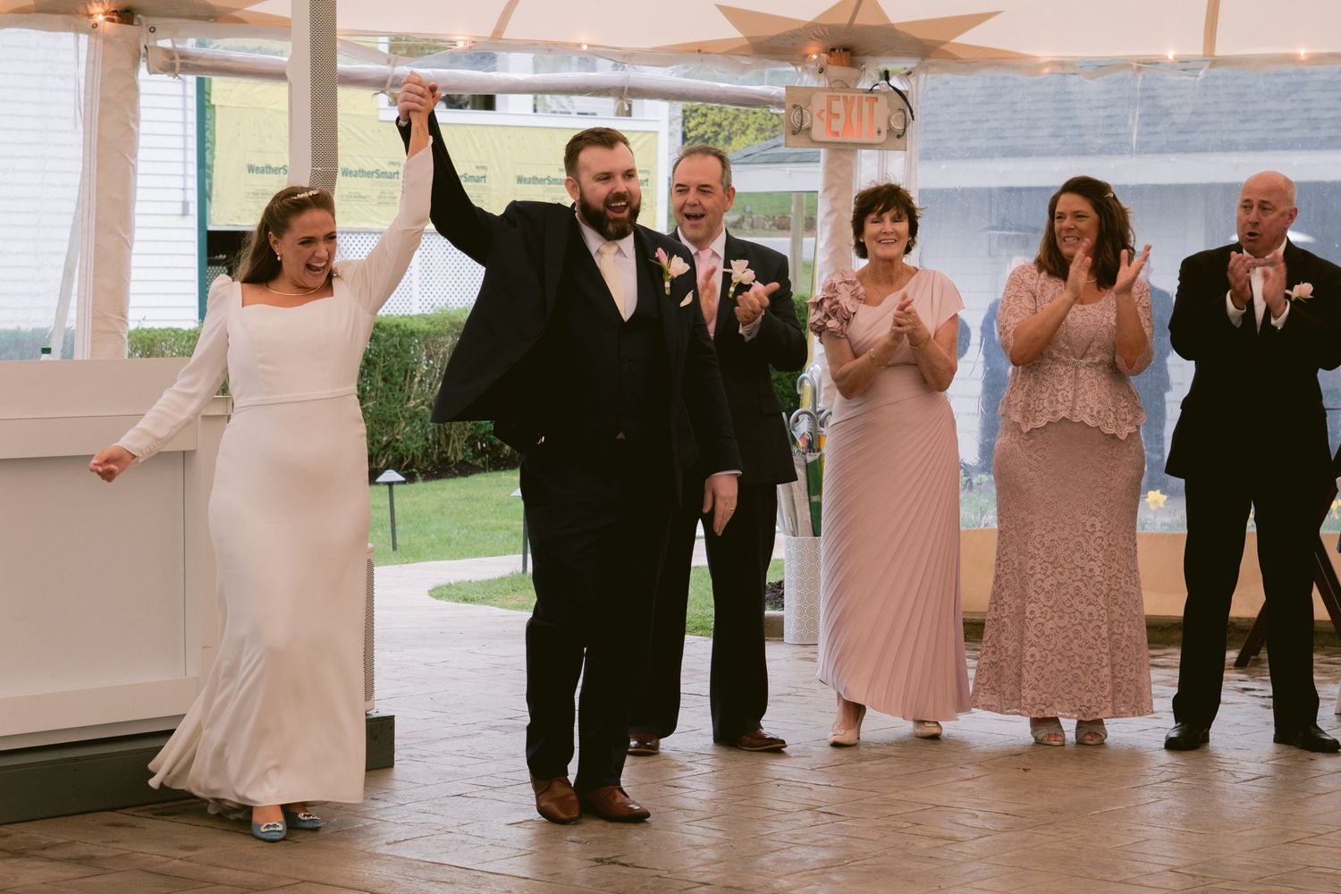 A newlywed couple at their wedding reception at the Sagamore Inn in Sandwich, MA, Cape Cod.