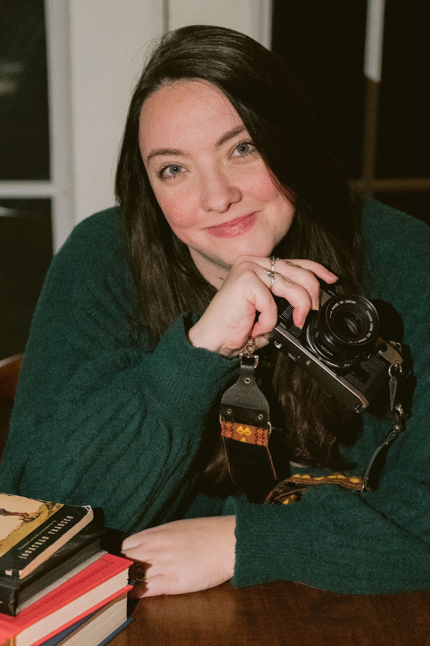 Woman posing with camera in Denton, TX
