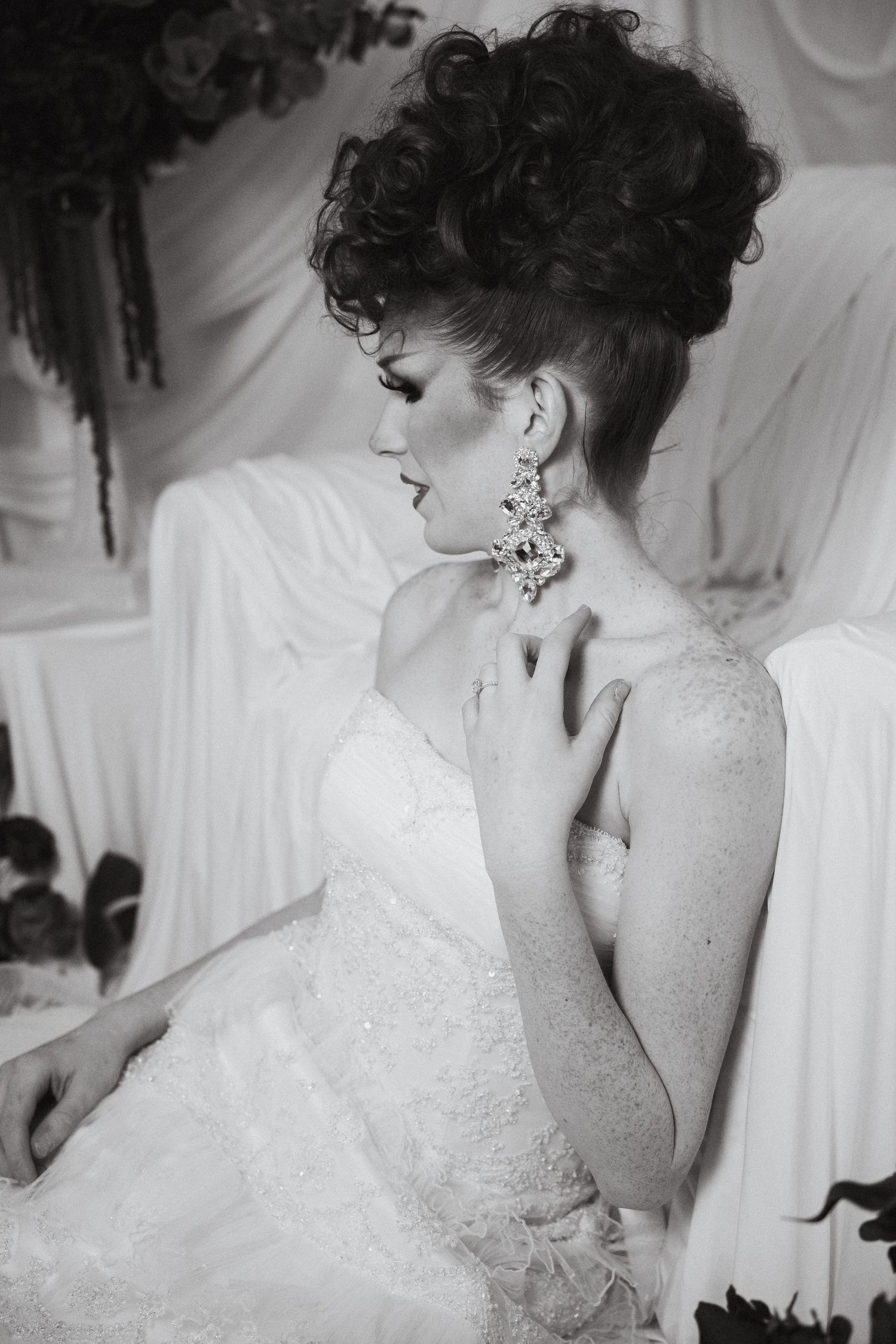 A bride gently looking off to the side