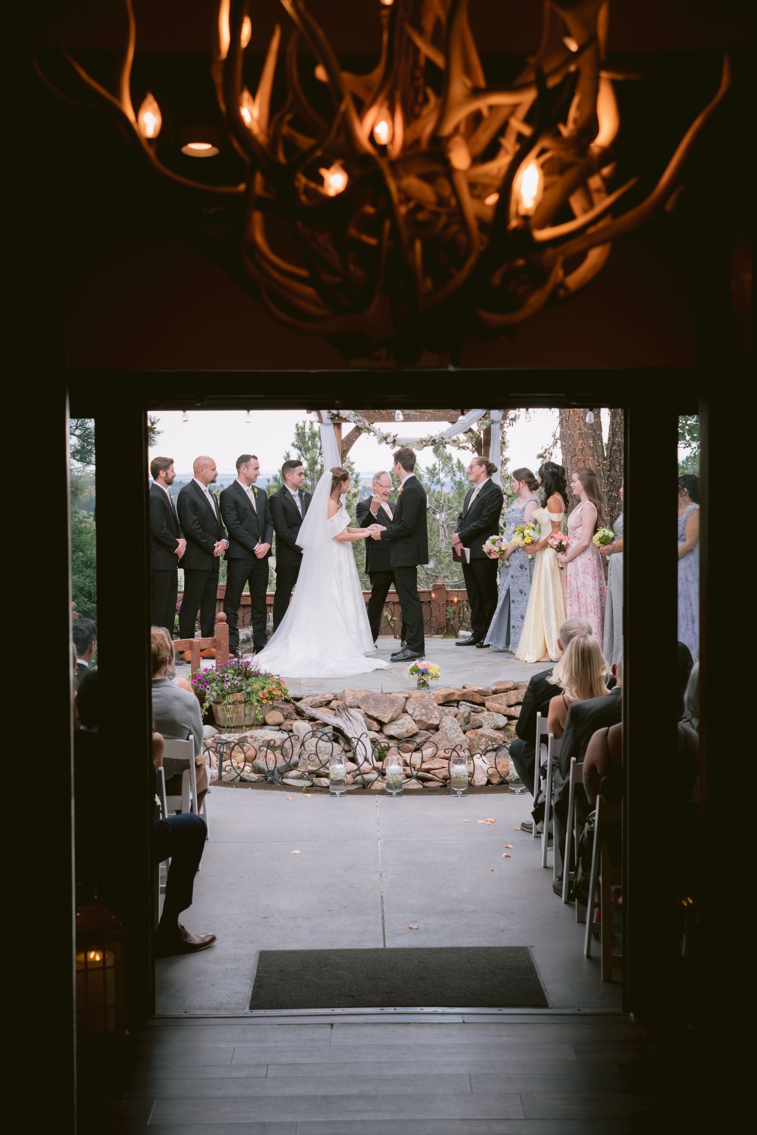 A newlywed couple at their wedding at Christie's of Genesee in Golden, Colorado.
