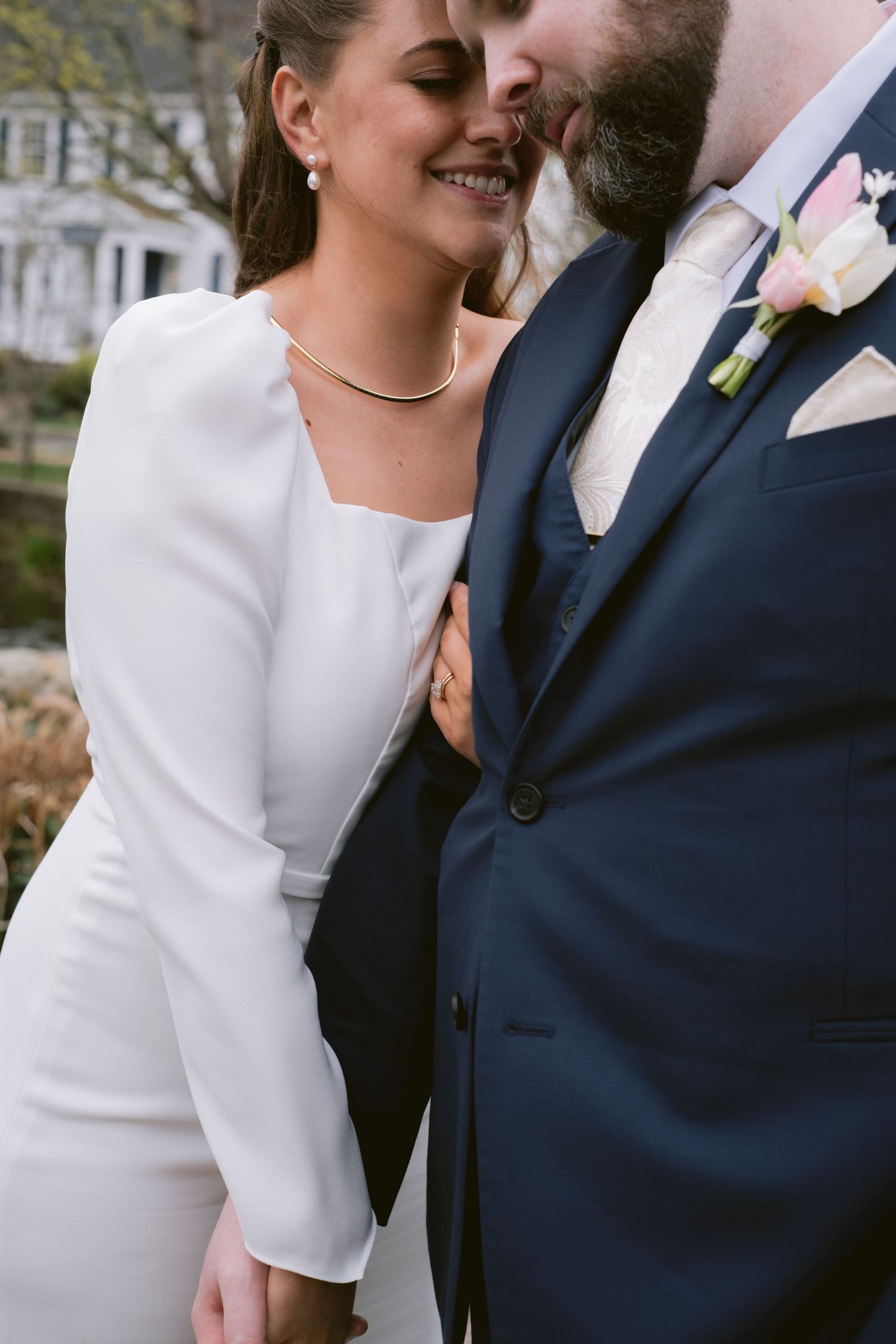 A newlywed couple at Dexter Grist Mill in Sandwich, MA, Cape Cod.