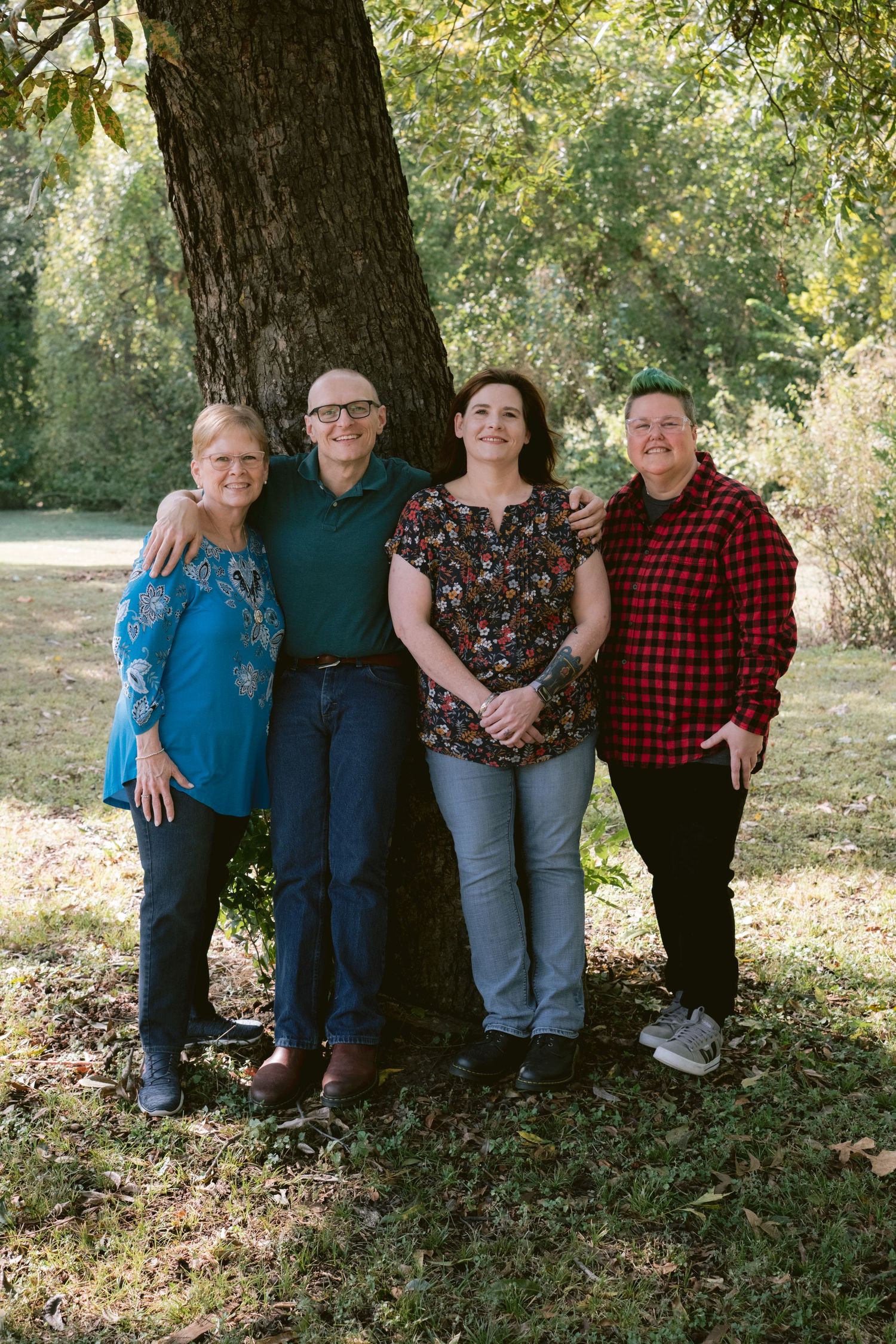 A family posing at Trinity Park in Fort Worth, TX