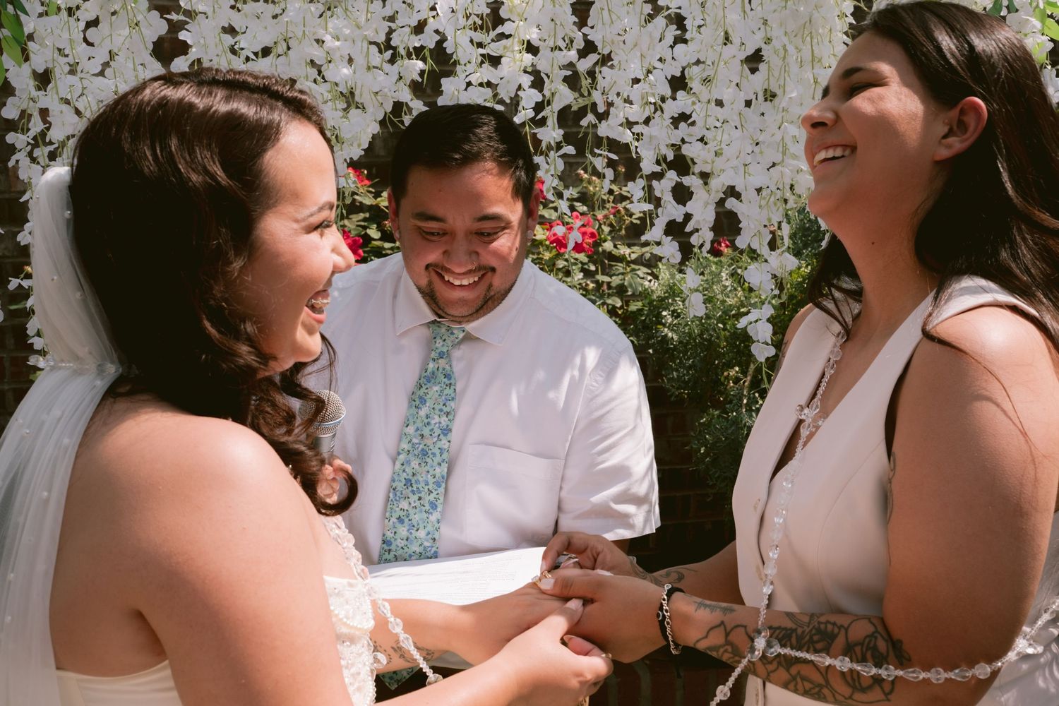 Two brides at their backyard wedding in Denton, TX