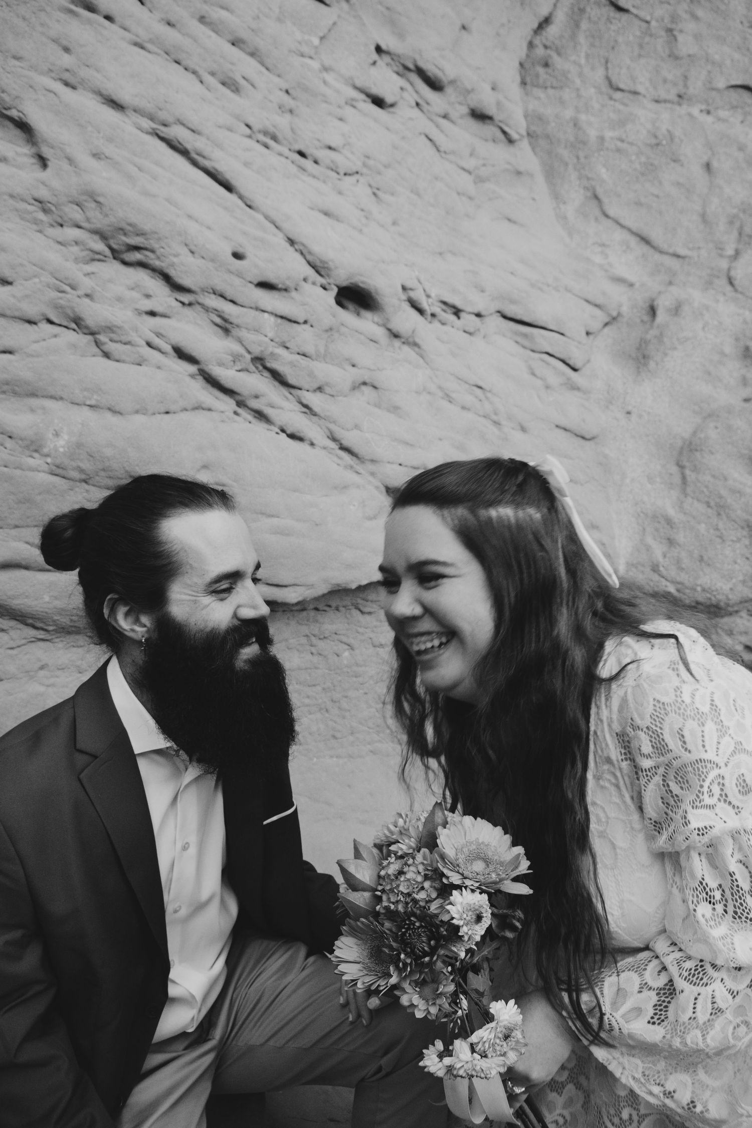 A couple laughing at their Garden of the Gods elopement