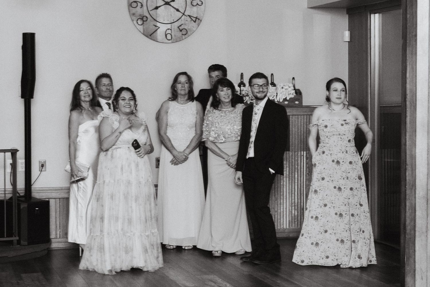 People watch a newlywed couple at their first dance at Christie's of Genesee in Golden, Colorado