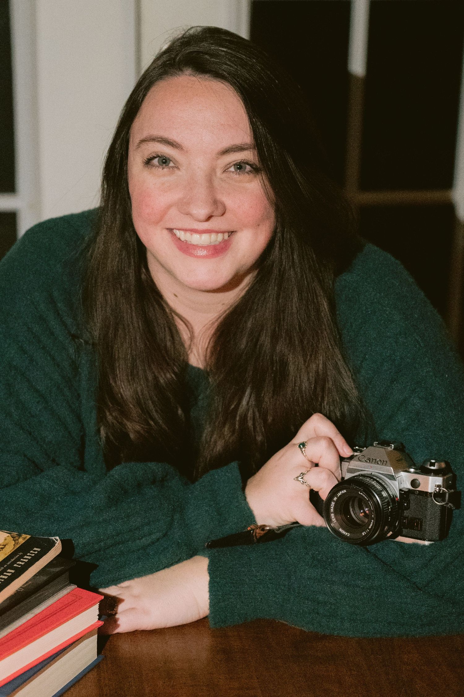 Woman posing with camera in Denton, TX