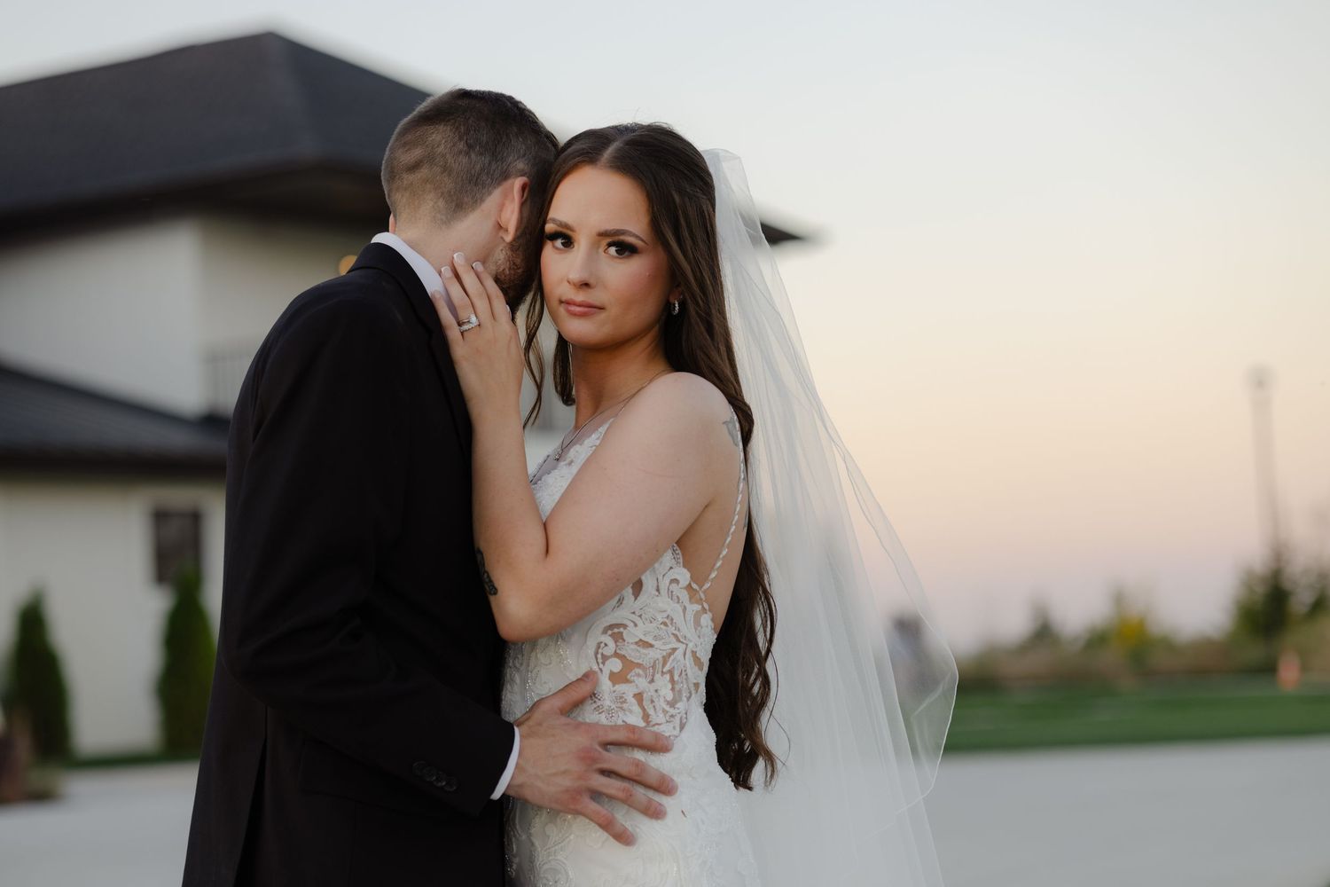 Golden hour portraits of the wedding couple at The Acreage in Palmyra Nebraska for a fall wedding.