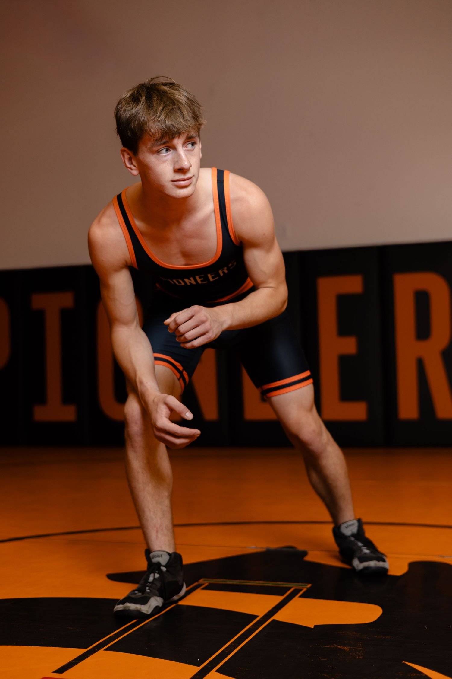 Wrestling Nebraska senior portraits at sunset in Fort Calhoun Nebraska