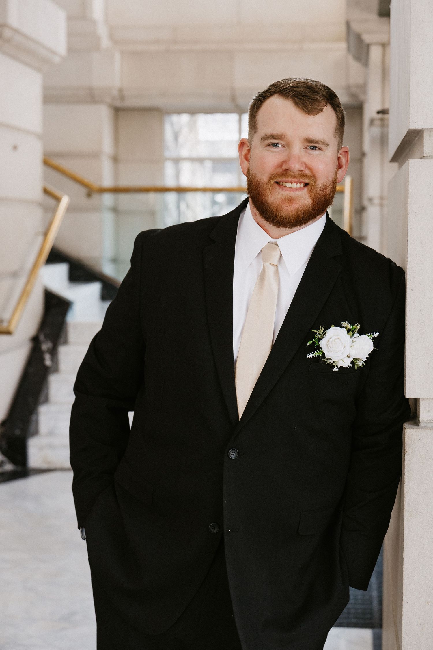 groom Leo Ballroom Omaha wedding portraits