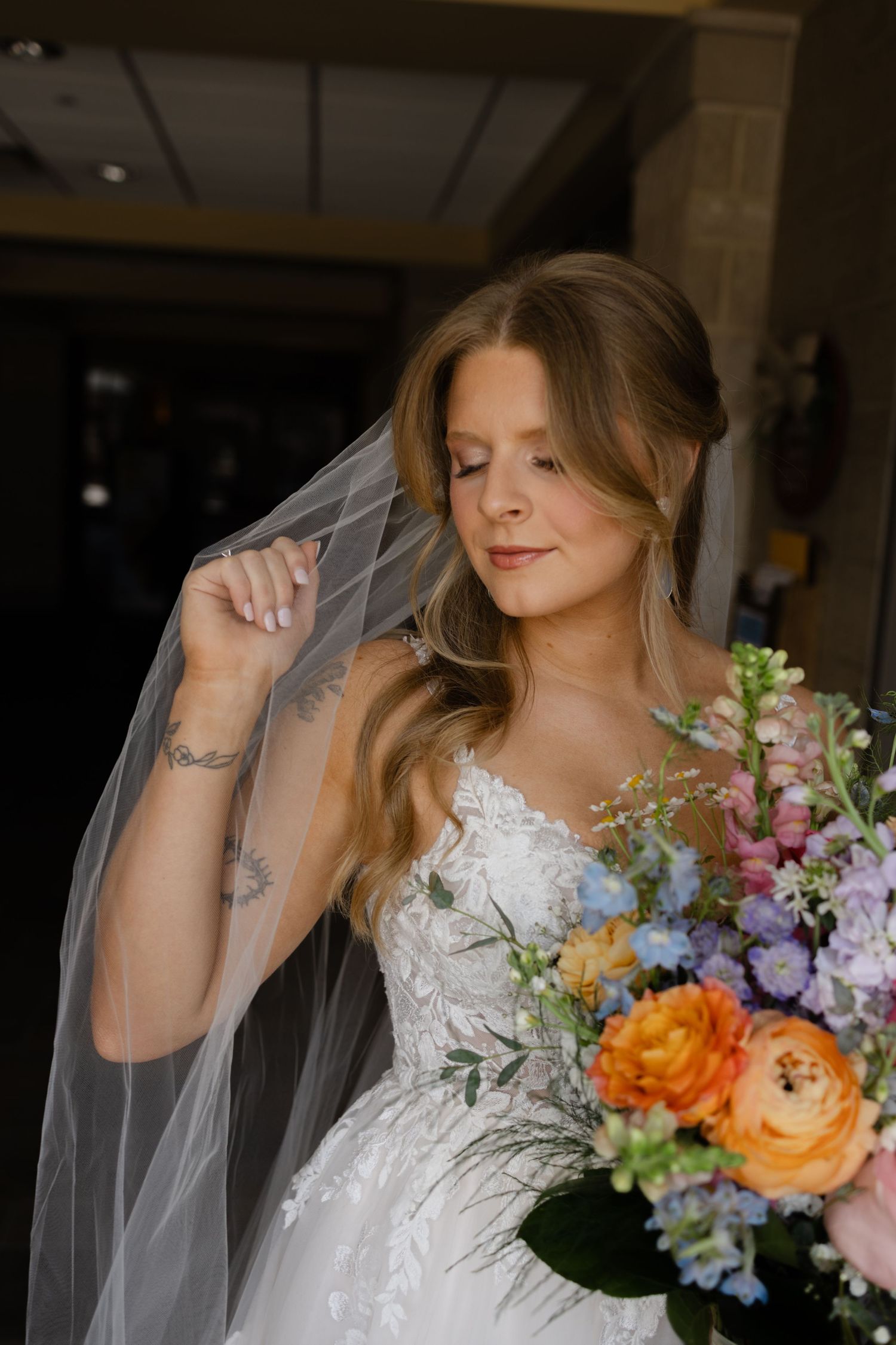 Wedding party portraits outside North American Martyrs Catholic Church in Lincoln Nebraska