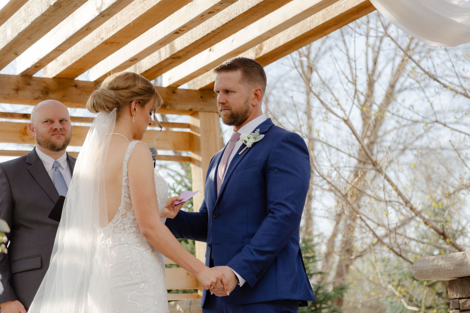 Outdoor wedding ceremony at Villa Aletta in Omaha, Nebraska with private scenic views.