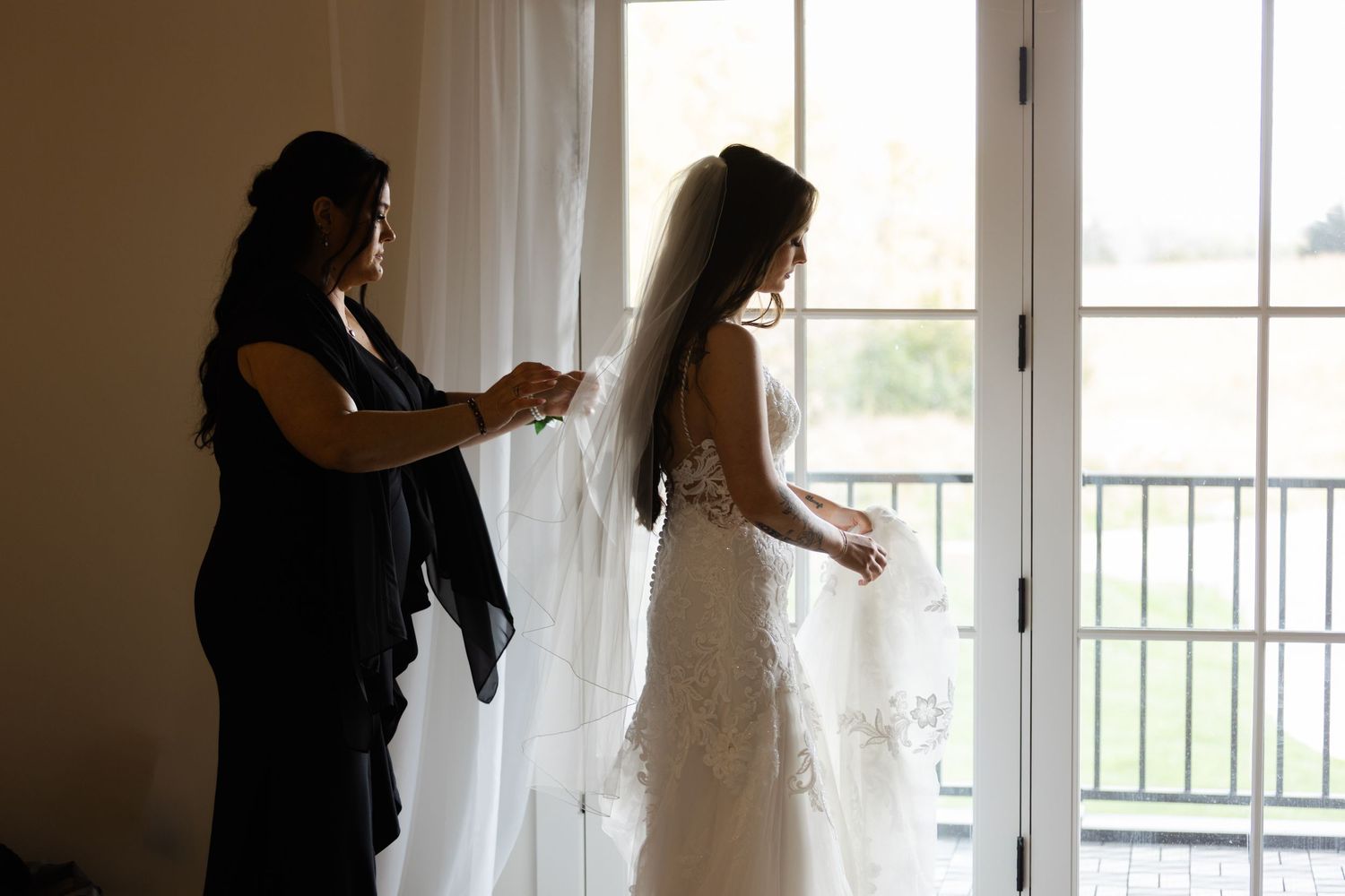 Bridal moment with Mother of the Bride at The Acreage in Palmyra Nebraska for a fall wedding.