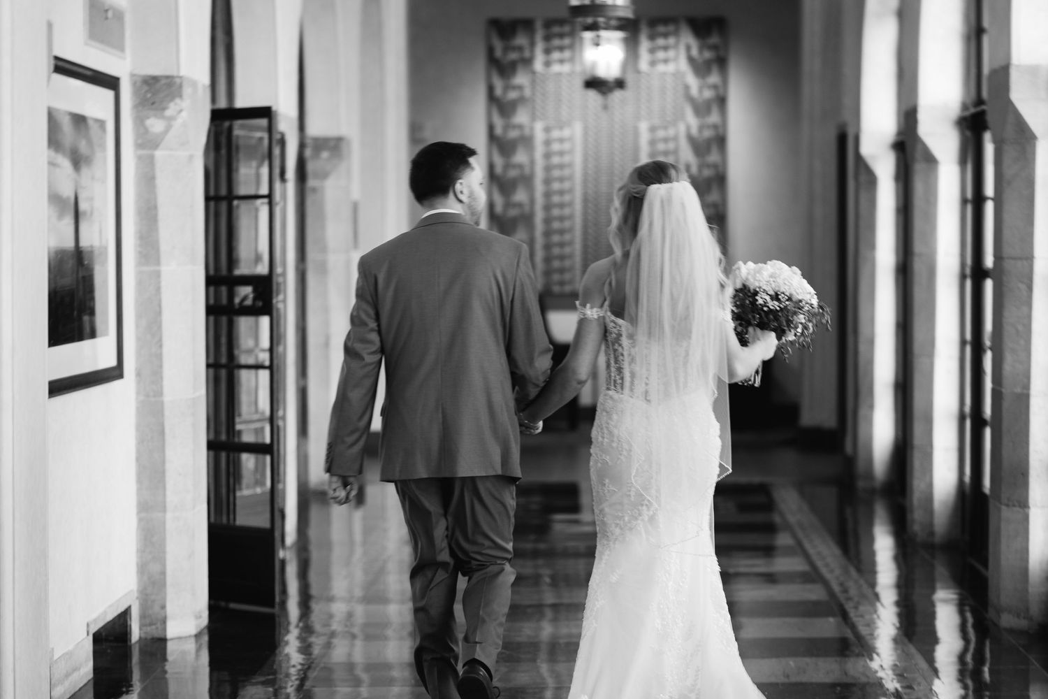 Lincoln Nebraska catholic wedding bride and groom walking away after saying I do.
