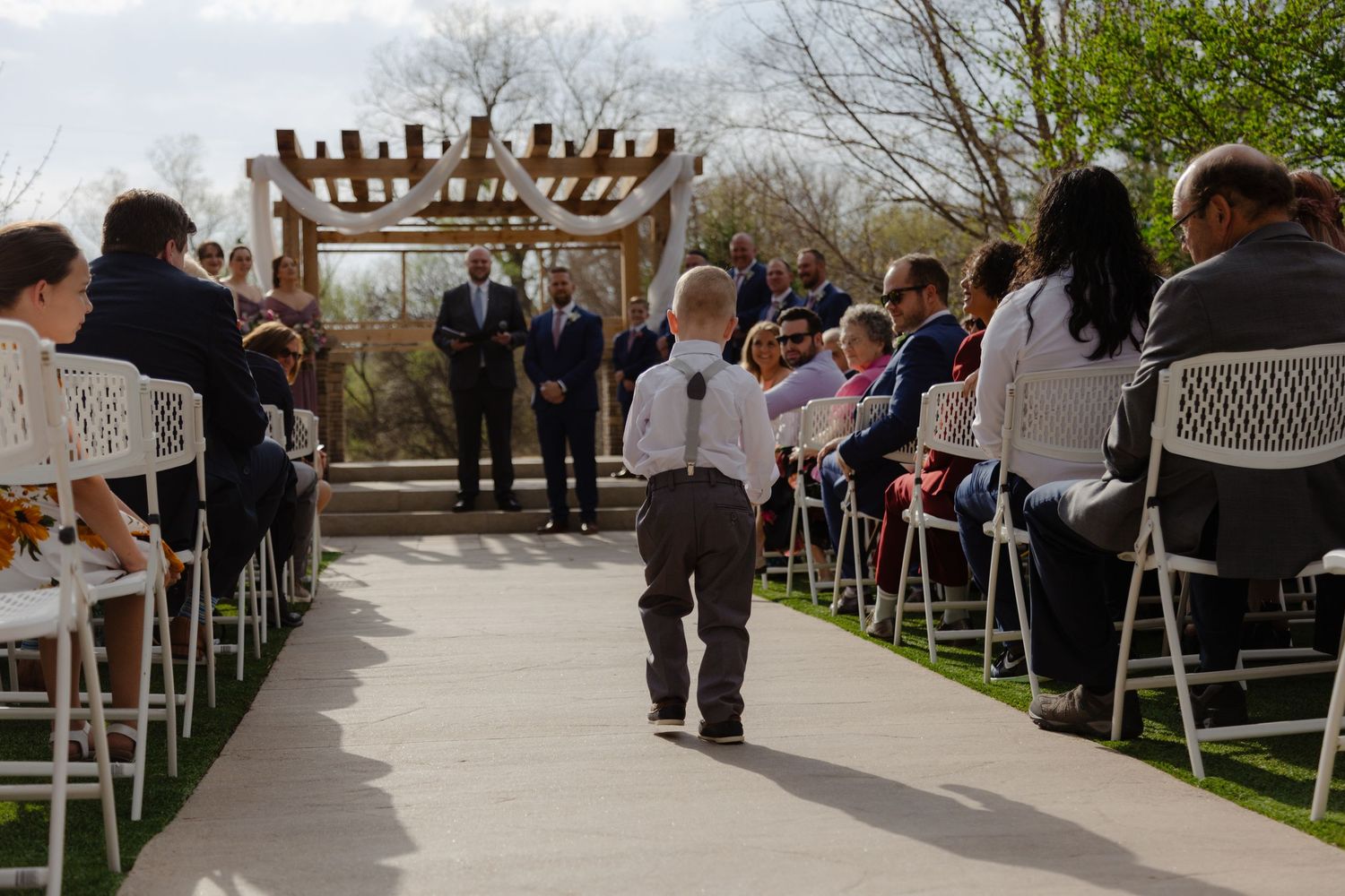 Outdoor wedding ceremony at Villa Aletta in Omaha, Nebraska with private scenic views.