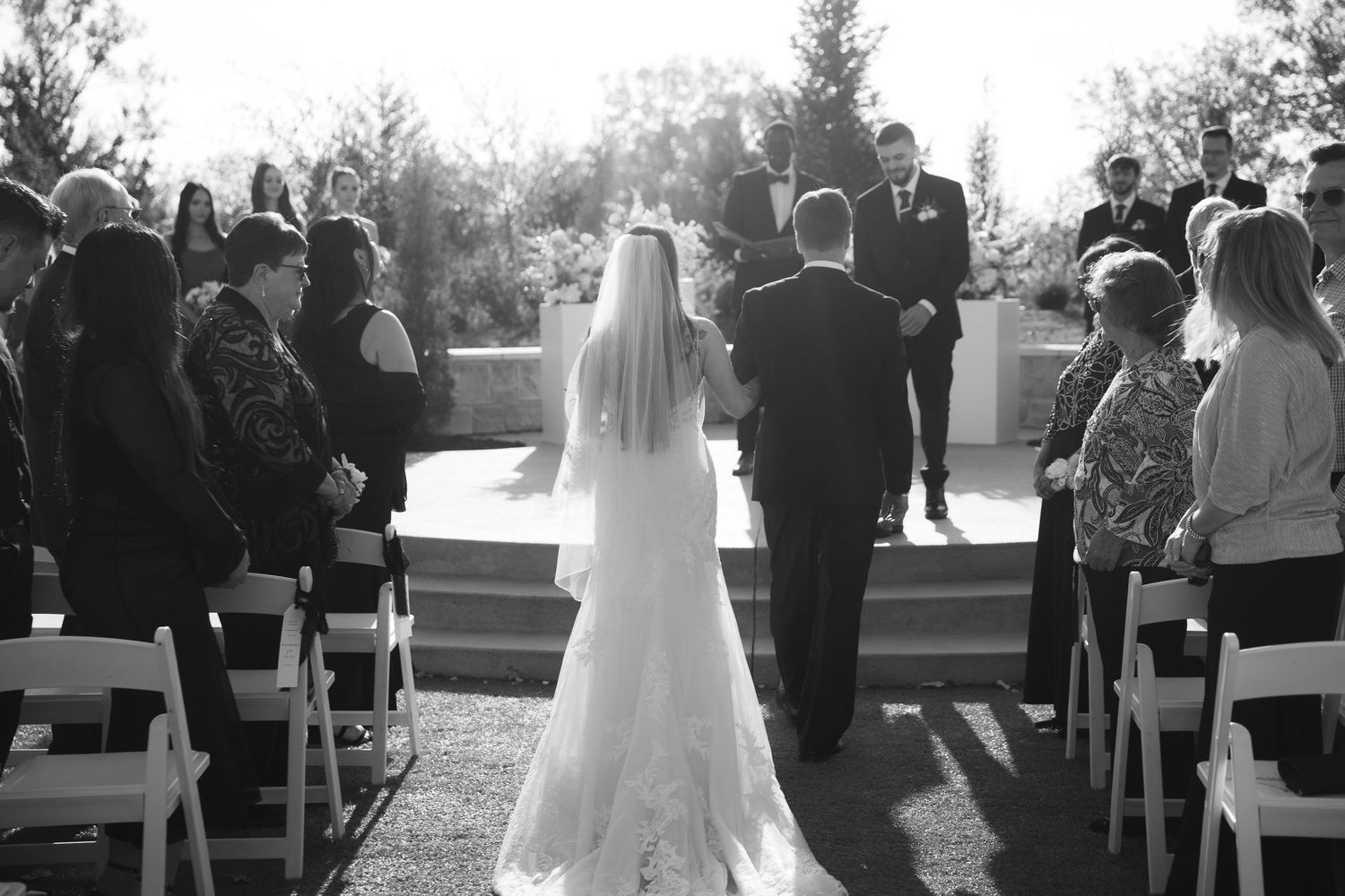 Ceremony photography at The Acreage in Palmyra Nebraska for a fall wedding.