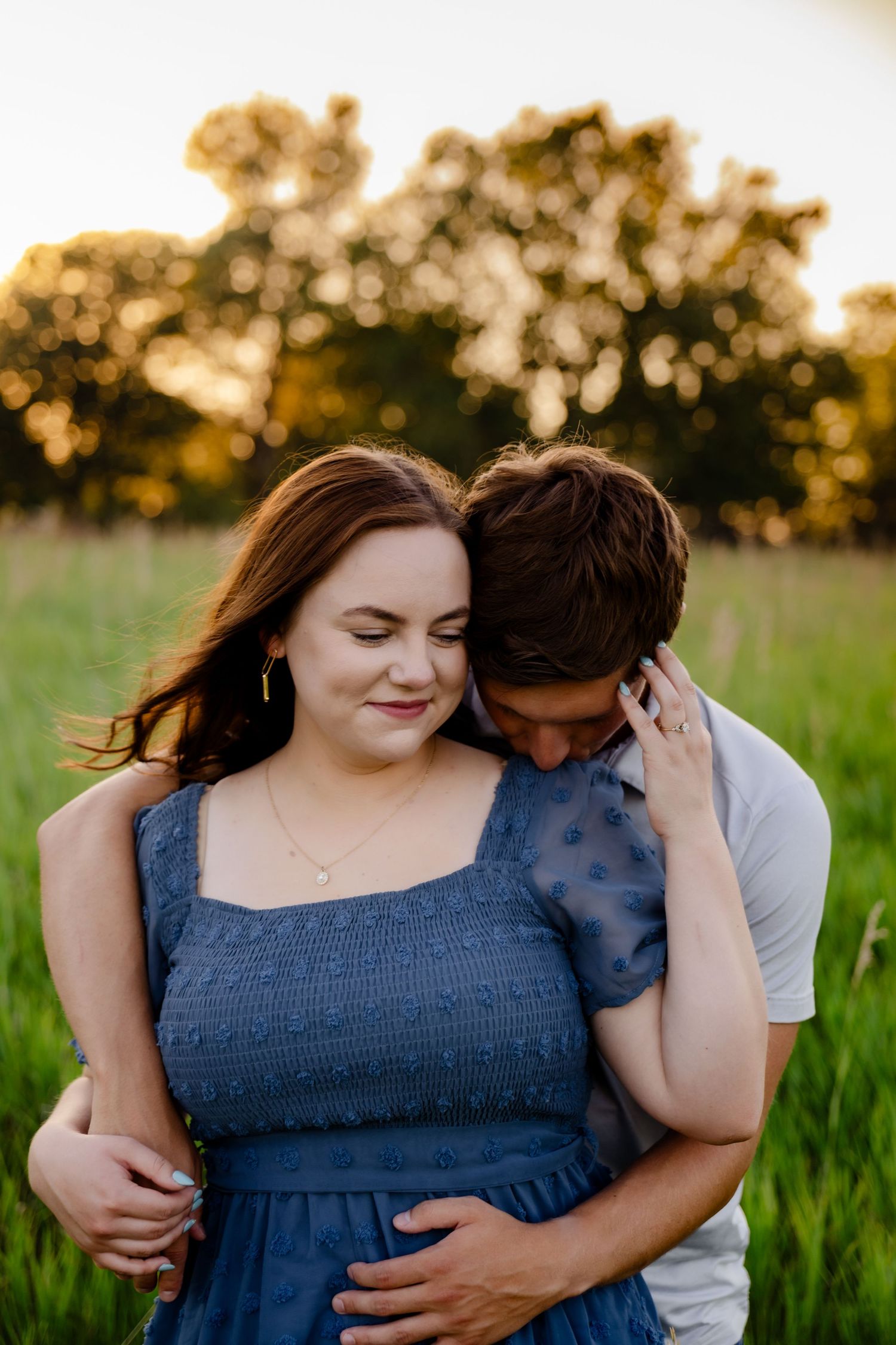 Midwest portrait session with soft, warm tones In Chalco Park in Omaha Nebraska for an Engagement session.