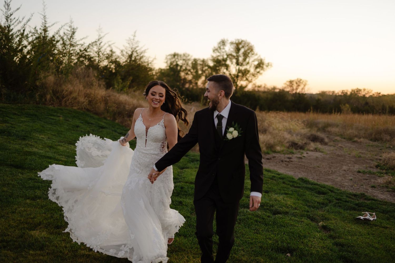 Golden hour portraits of the wedding couple at The Acreage in Palmyra Nebraska for a fall wedding.