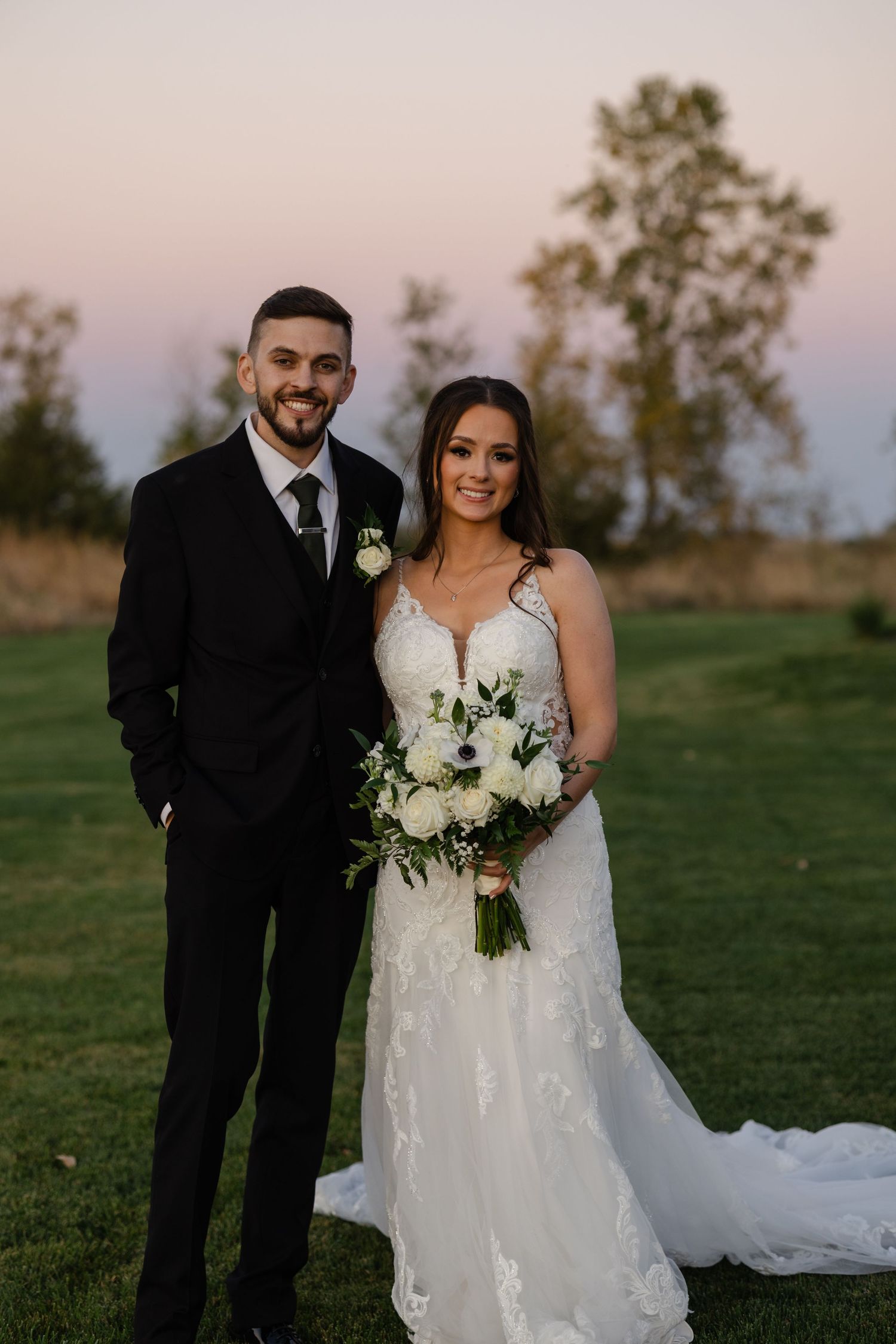 Golden hour portraits of the wedding couple at The Acreage in Palmyra Nebraska for a fall wedding.