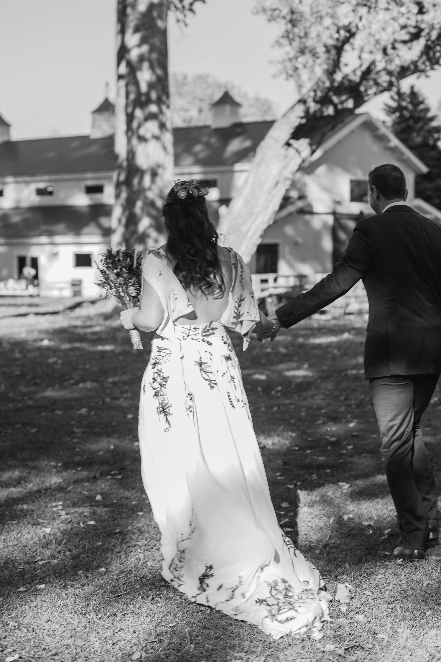 just married couple walking together Lilac Hill Louisville Nebraska wedding Omaha Nebraska photographer