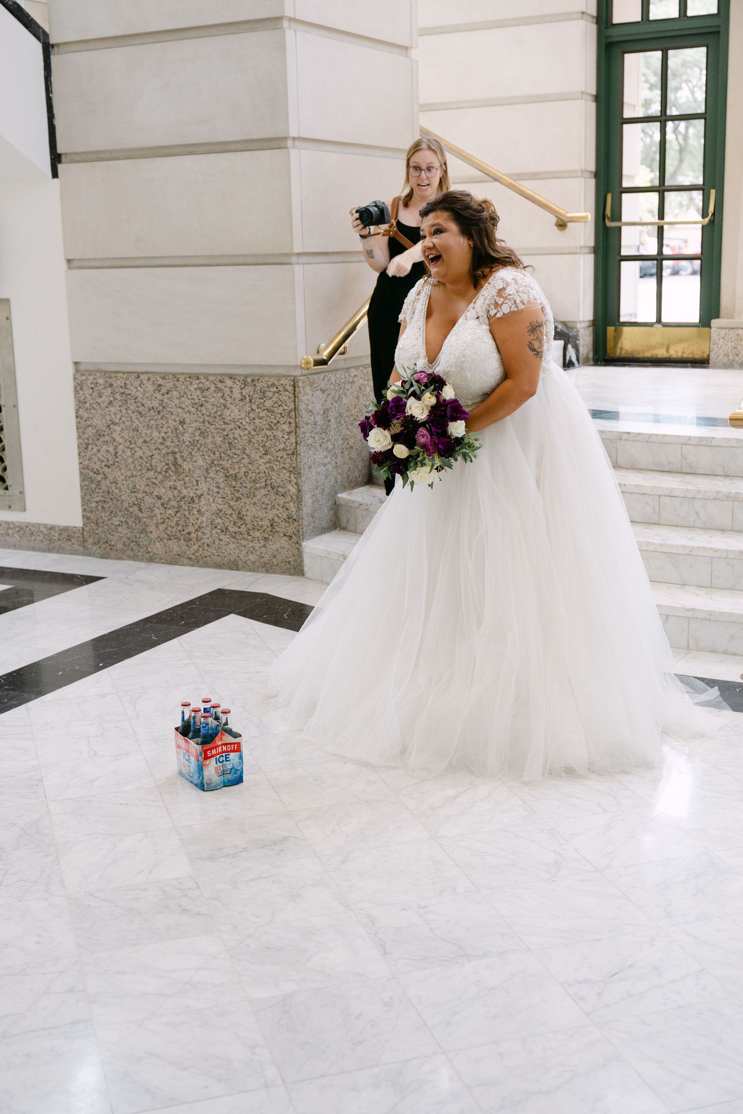 Leo Ballroom wedding venue in Omaha, Nebraska showcasing classic indoor elegance and joyful celebrations. Kinsey Nixon- Bay Wedding Photo