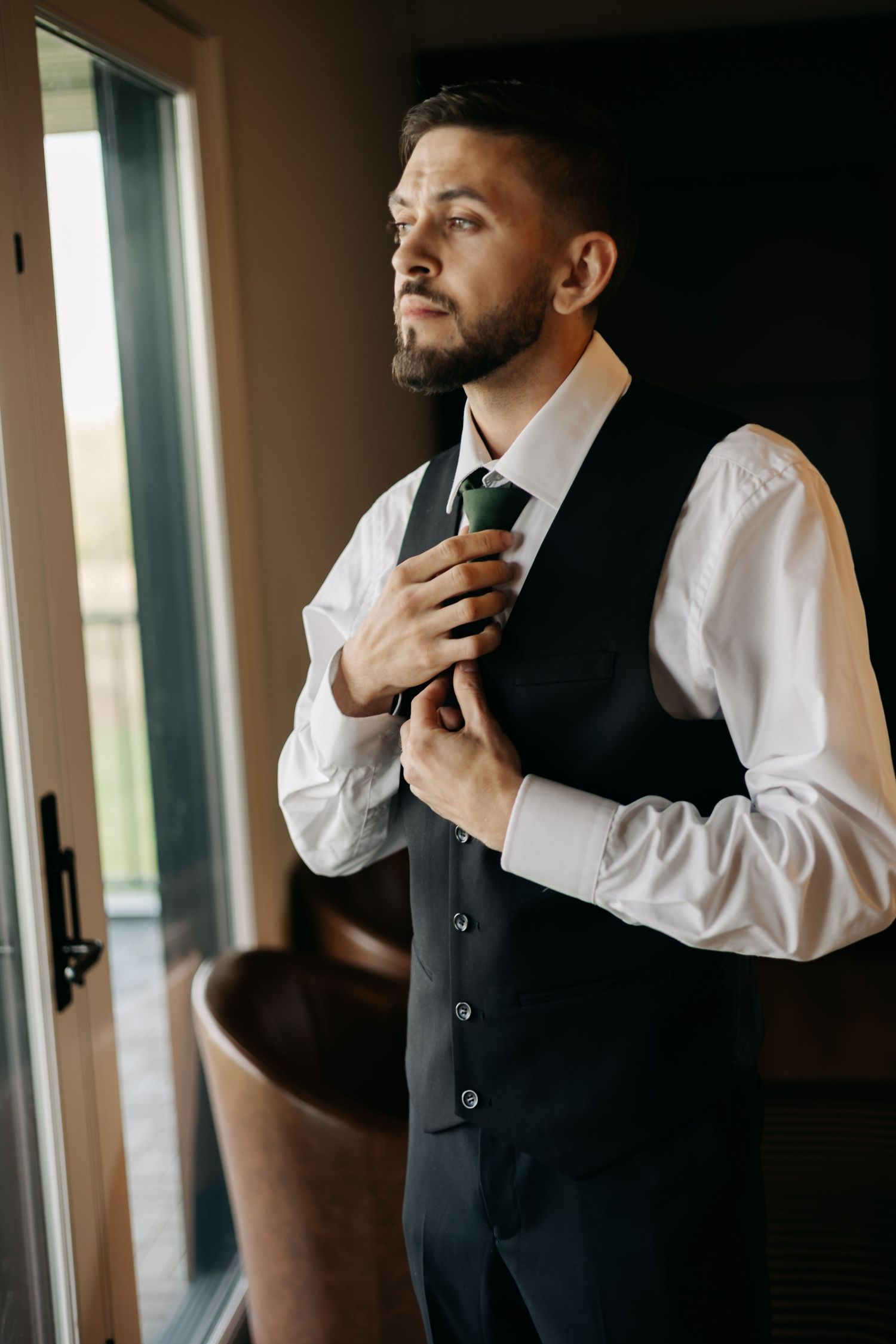 Groom portrait  at The Acreage in Palmyra Nebraska for a fall wedding.