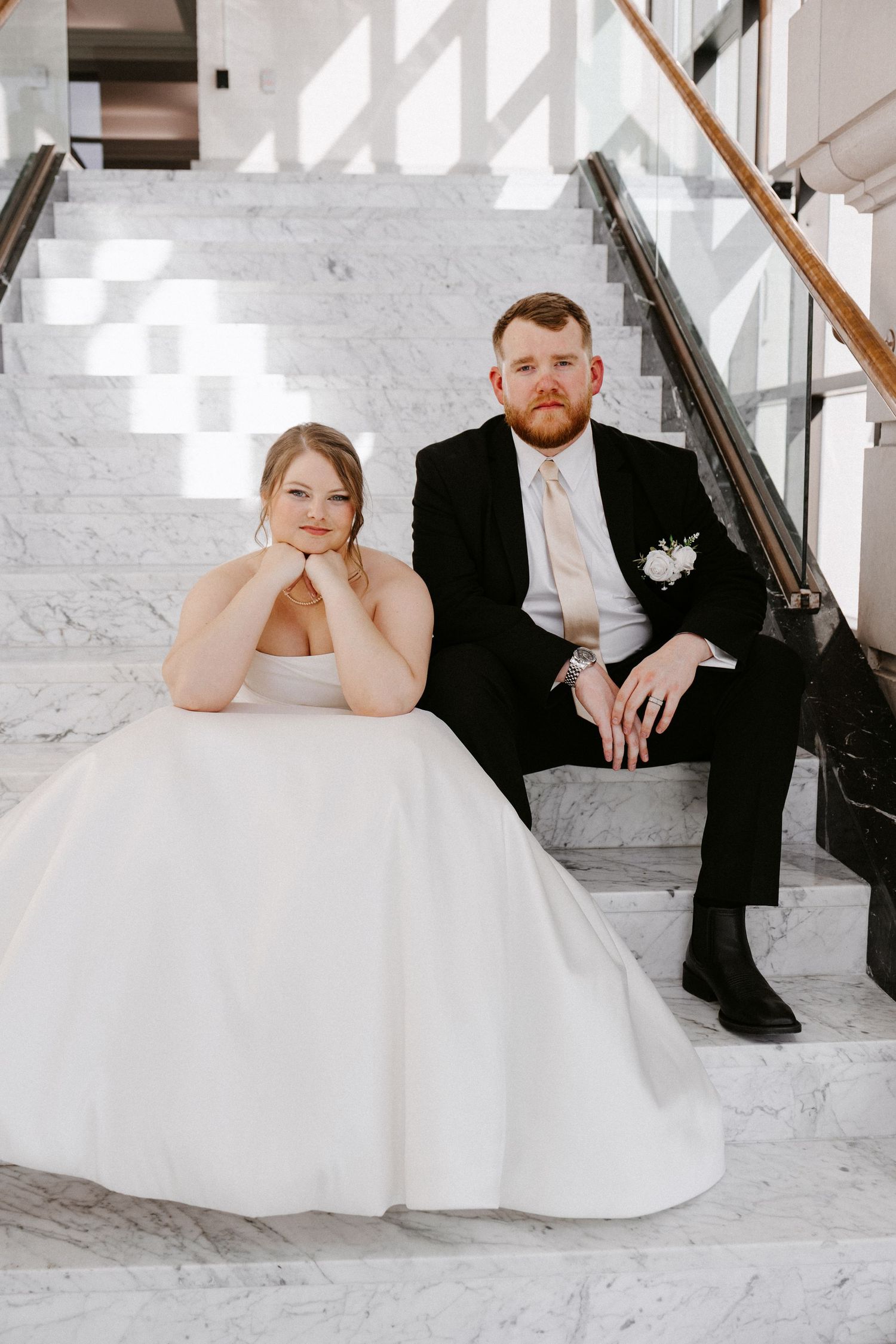 romantic wedding portraits Omaha Nebraska couple at the Leo Ballroom at their beautiful marble steps.