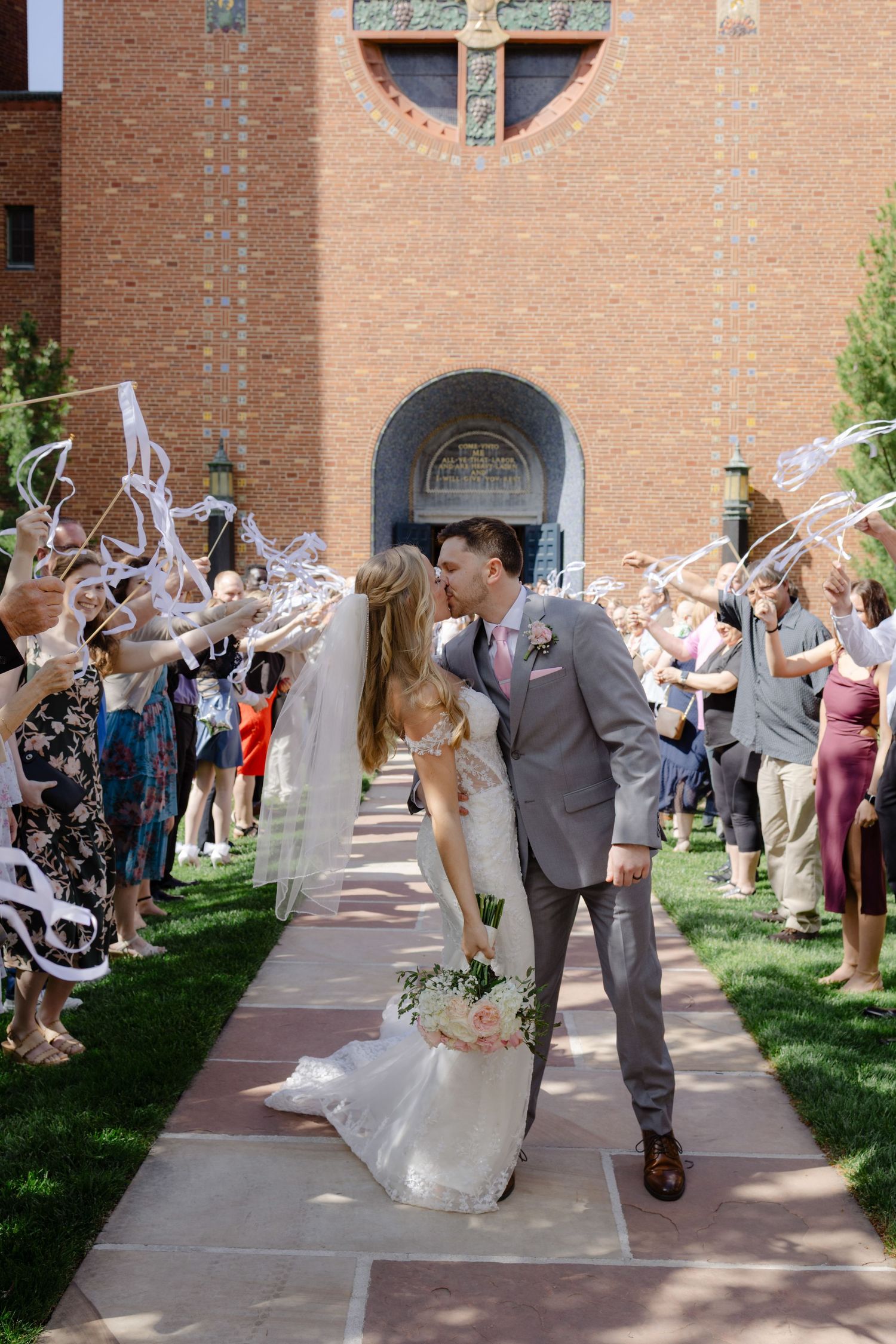 Lincoln nebraska wedding send off of the bride and groom on a summer wedding