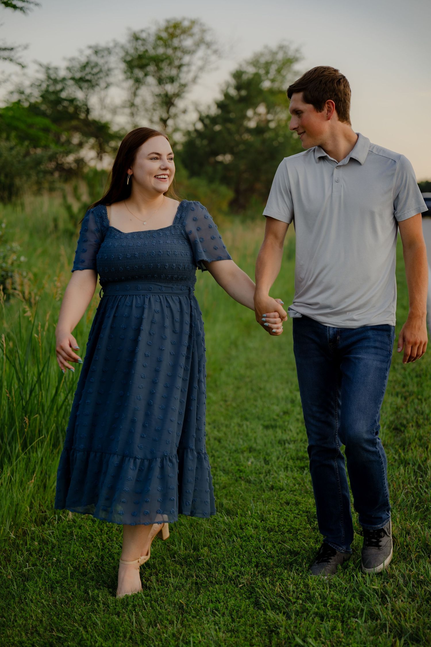 Midwest portrait session with soft, warm tones In Chalco Park in Omaha Nebraska for an Engagement session.