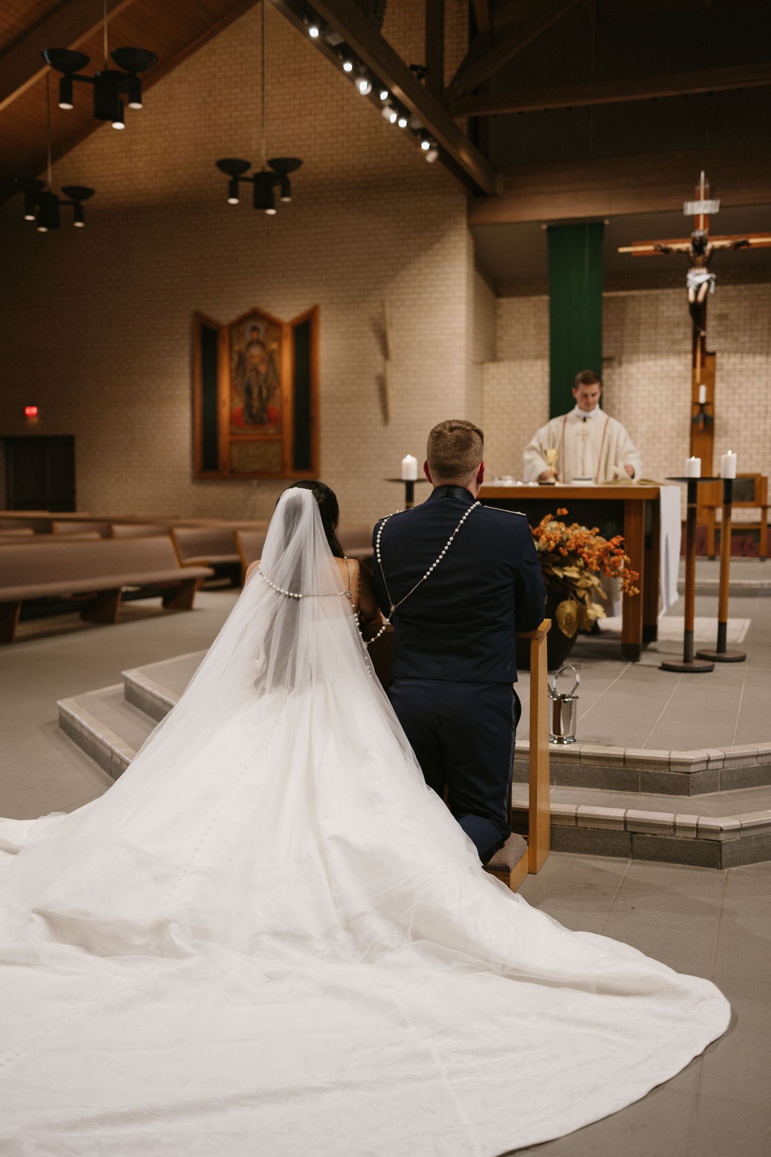Ceremony couple detail shot in black and white at Saint Stevens Catholic Church in Omaha Nebraska.